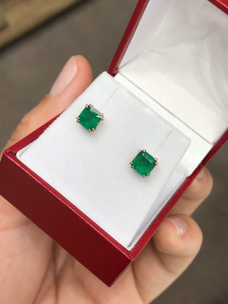 Rose gold double prong earrings with natural emeralds, 1.52 carats, by JR Colombian Emeralds, featuring elegant gemstone settings.
