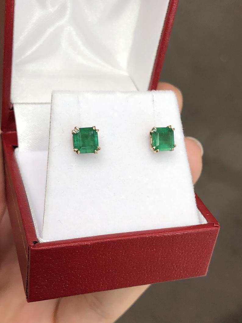 Rose gold double prong natural emerald earrings with 1.52tcw from JR Colombian Emeralds, featuring vibrant green gemstones.