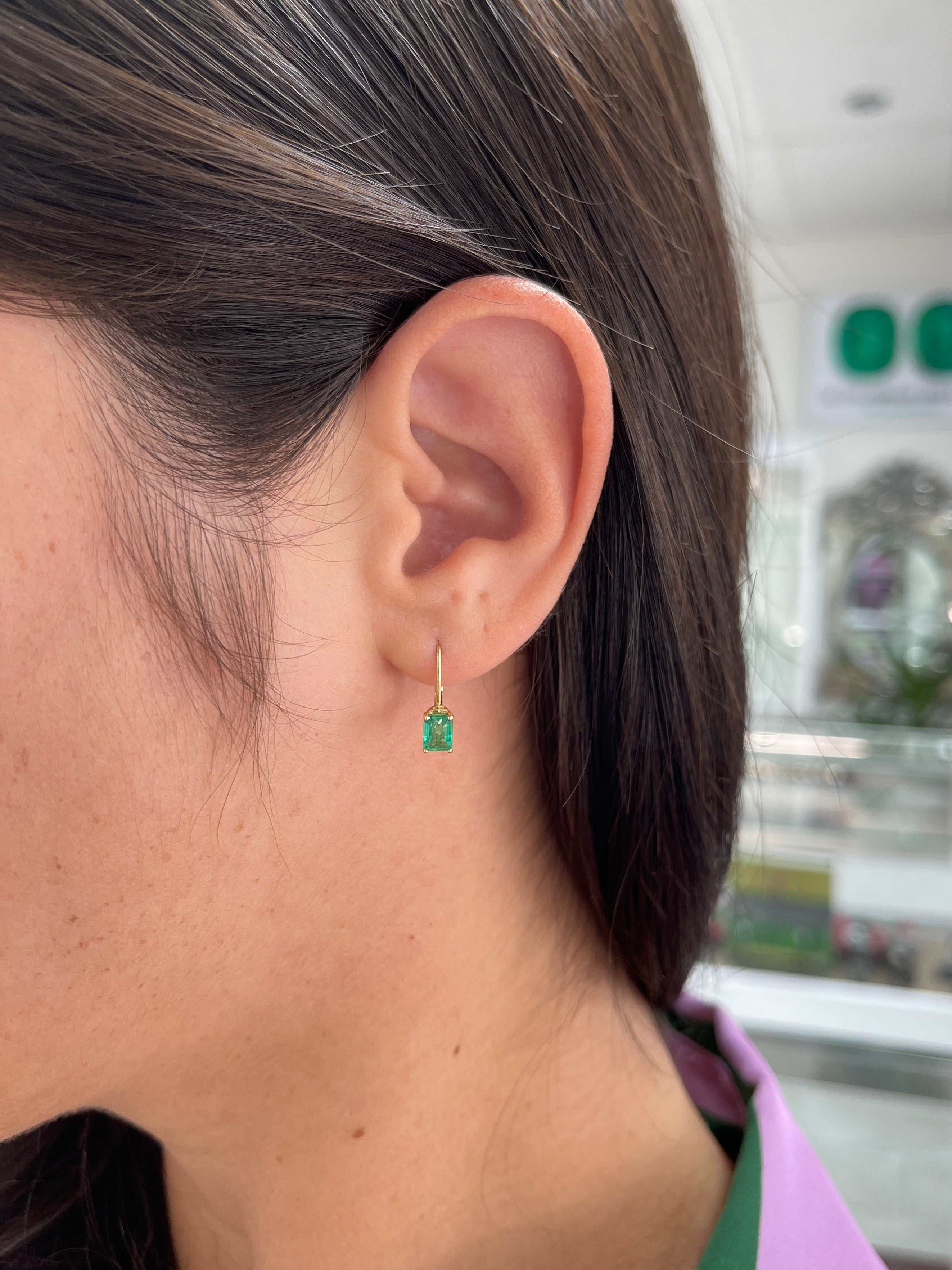 14K gold earrings with 1.50tcw emerald-cut natural emeralds in prong setting and lever back design by JR Colombian Emeralds