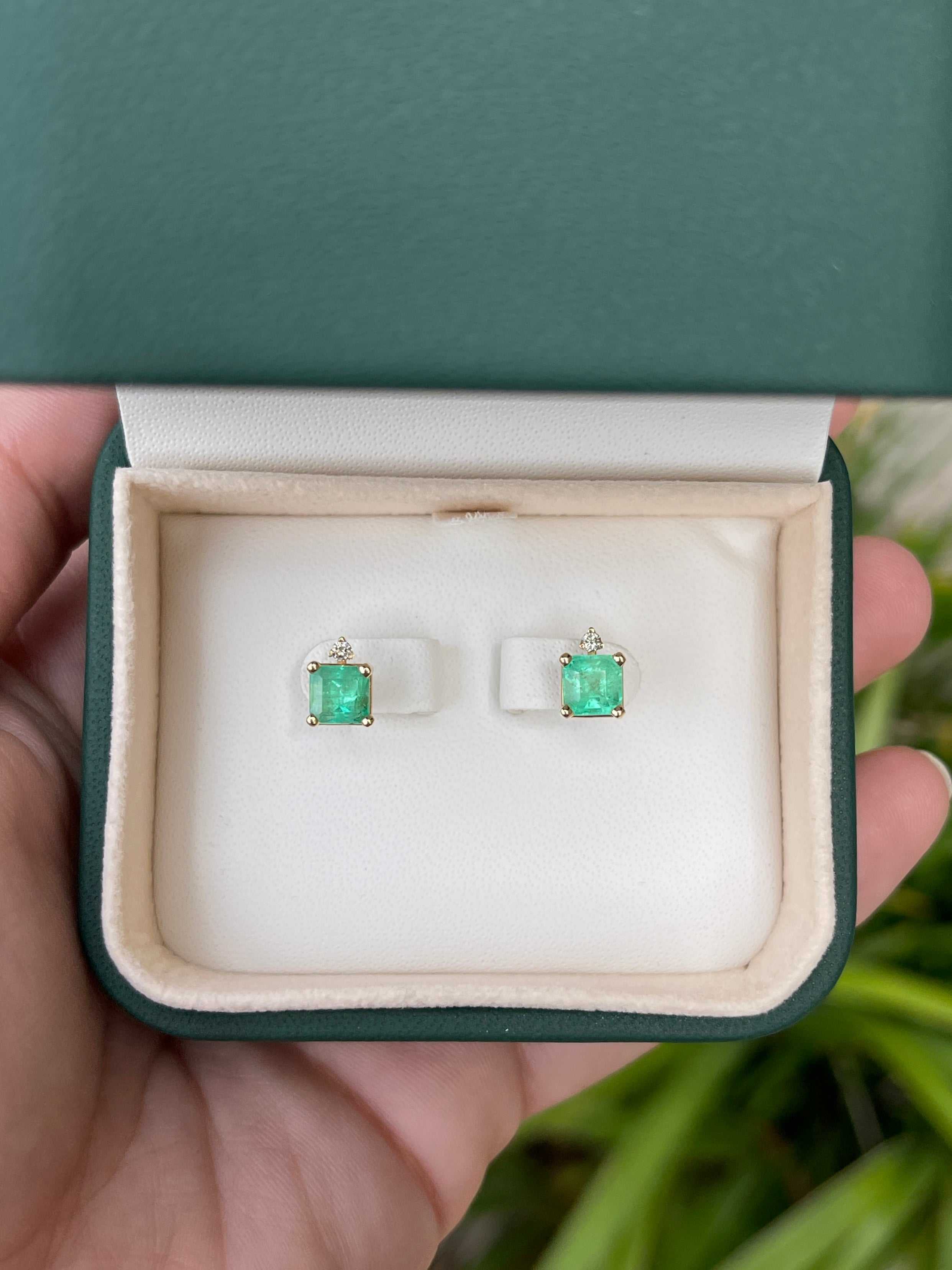 JR Colombian Emeralds 14K gold stud earrings with 2.07tcw natural emeralds and diamond accents, showcasing elegant jewelry design.