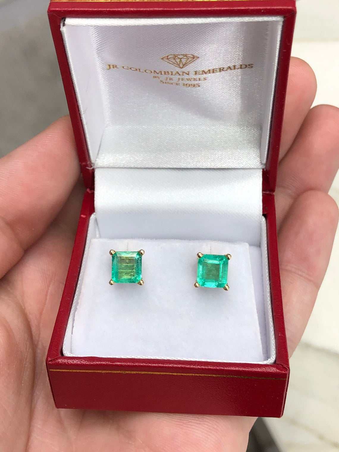 Asscher shape medium green emerald earrings in 14K gold with 2.0 tcw from JR Colombian Emeralds, showcasing elegant gemstone details.