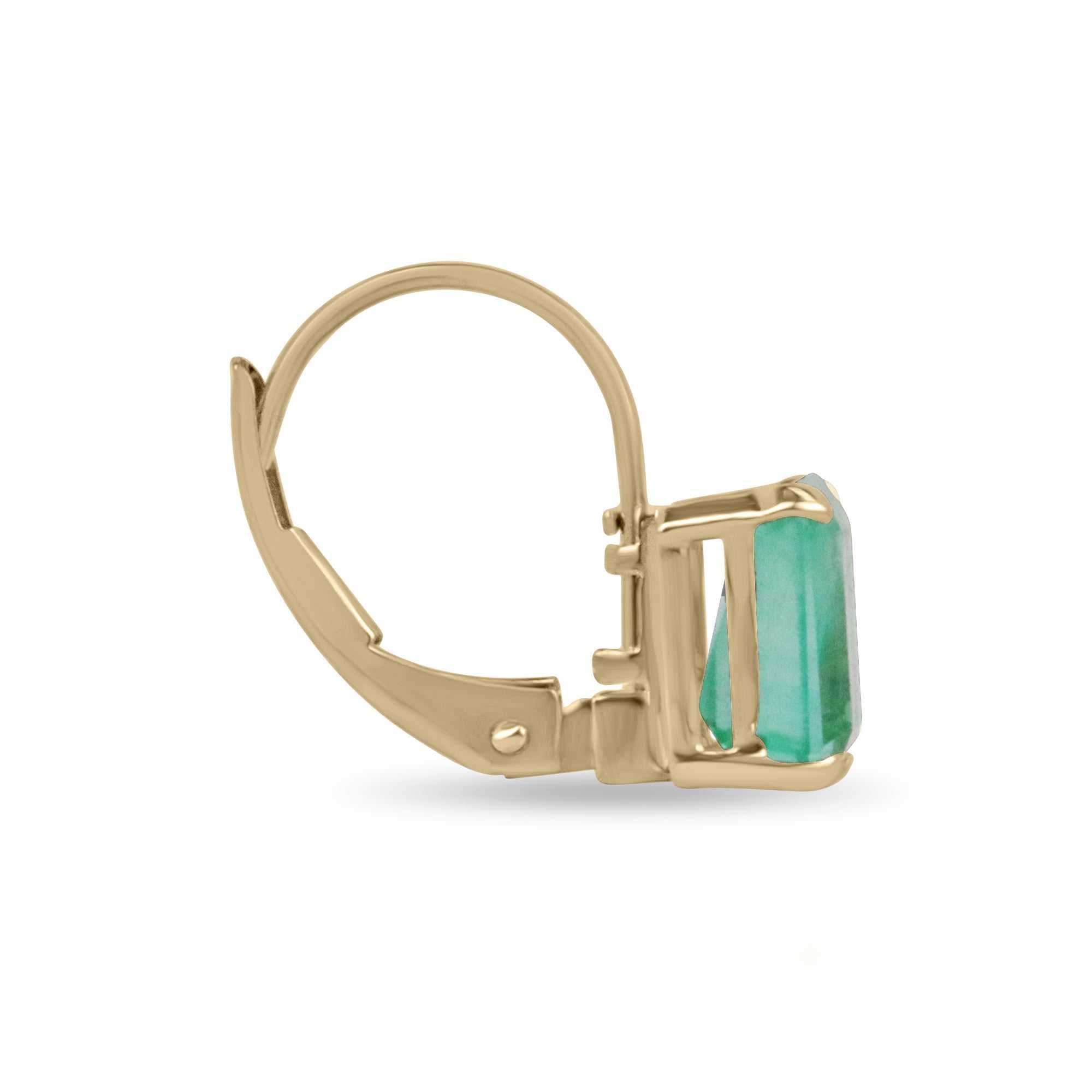 Transparent emerald cut Colombian emerald earrings with 14K gold leverbacks, featuring 2.41 carats of real Colombian emeralds.