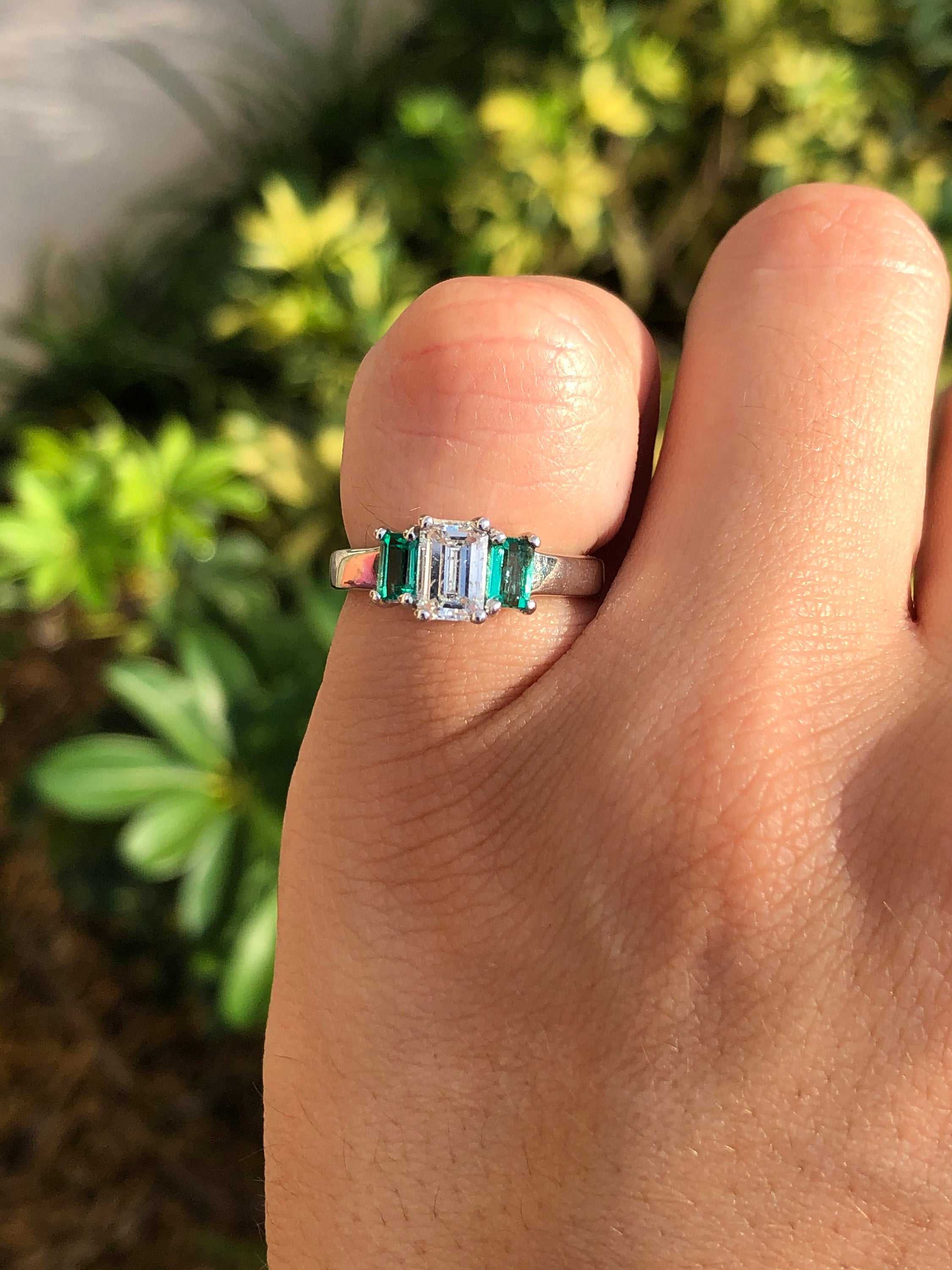 JR Colombian Emeralds 1.27tcw classic three-stone engagement ring with diamonds and emeralds in 14K gold, showcasing elegant gemstone details.