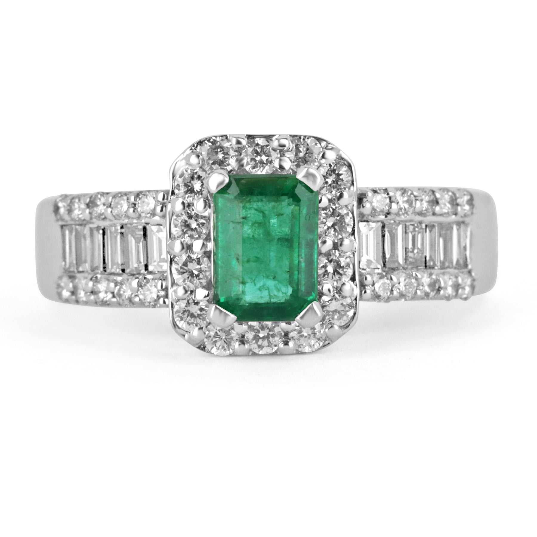 Green emerald and diamond engagement ring featuring round and baguette diamonds in 14K gold, by JR Colombian Emeralds.
