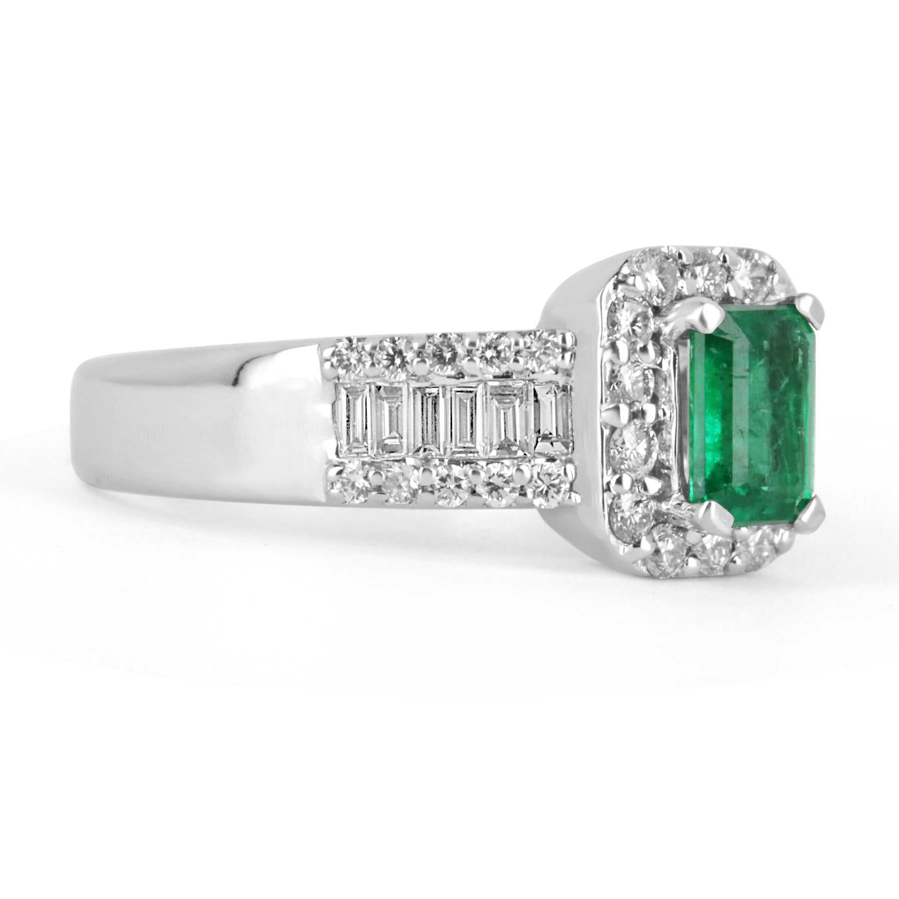 Natural green emerald and diamond engagement ring with round and baguette cuts in 14K gold by JR Colombian Emeralds.