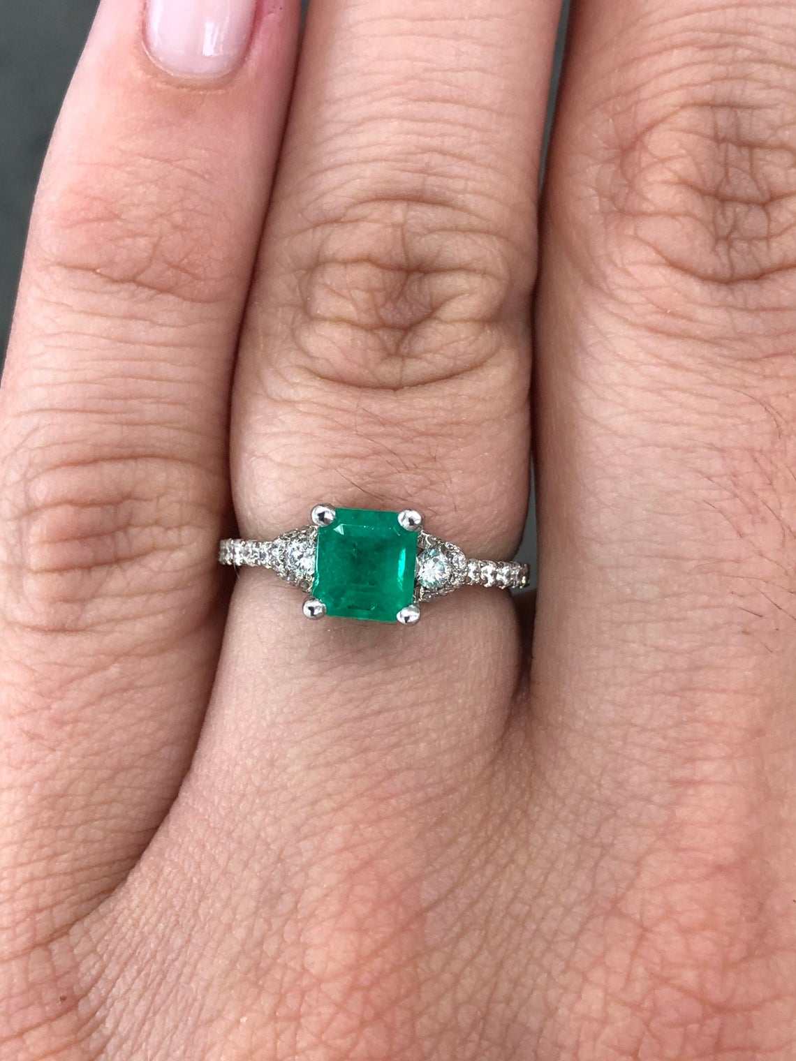 JR Colombian Emeralds AAA 1.68tcw emerald solitaire engagement ring with diamond accents in 14K gold.