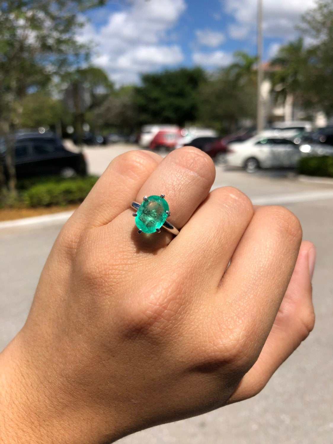 14K gold engagement ring with a 3.20ct oval cut Colombian emerald solitaire, featuring a classic design by JR Colombian Emeralds.