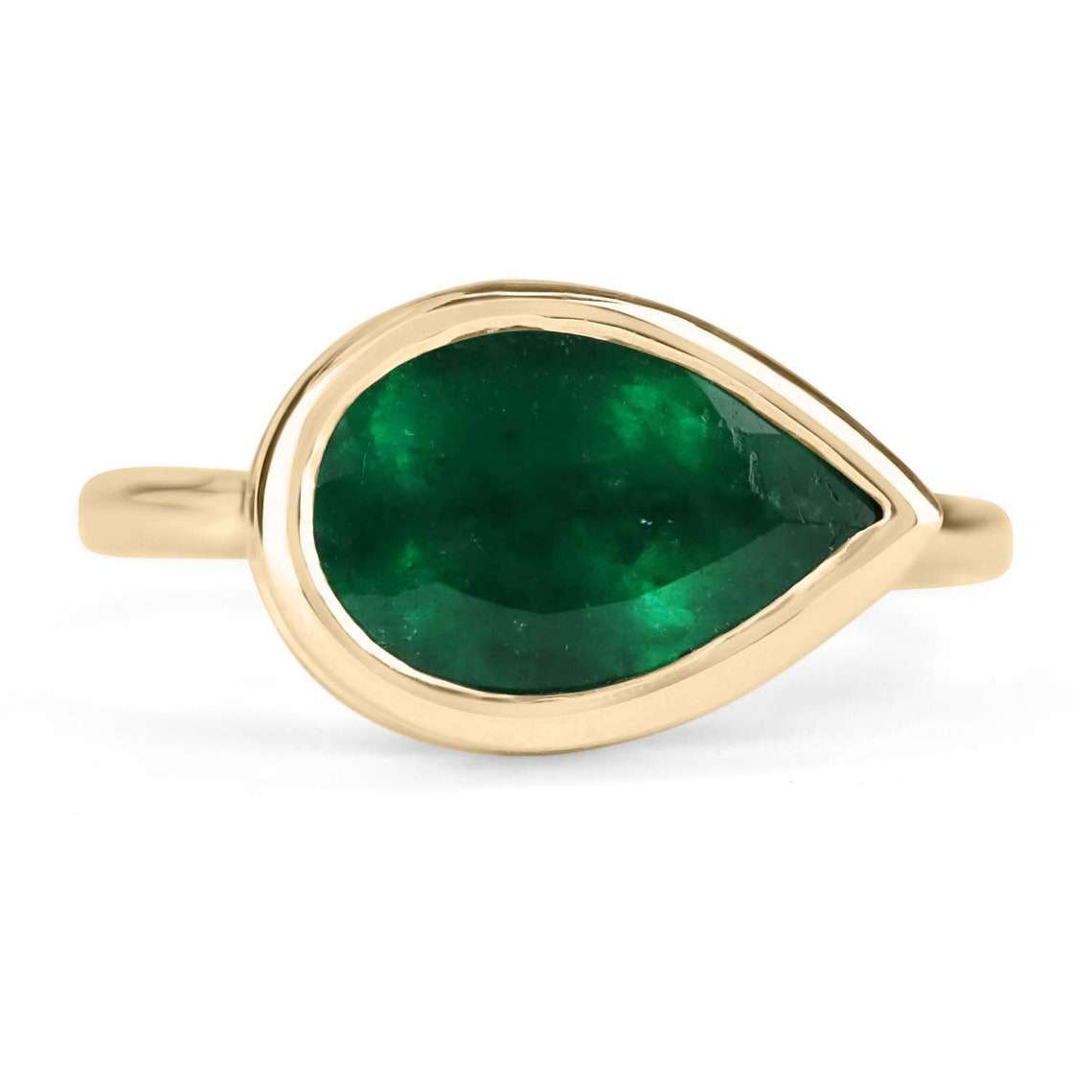 2.18 carat dark forest green pear-shaped emerald bezel set solitaire ring in 18K yellow gold
