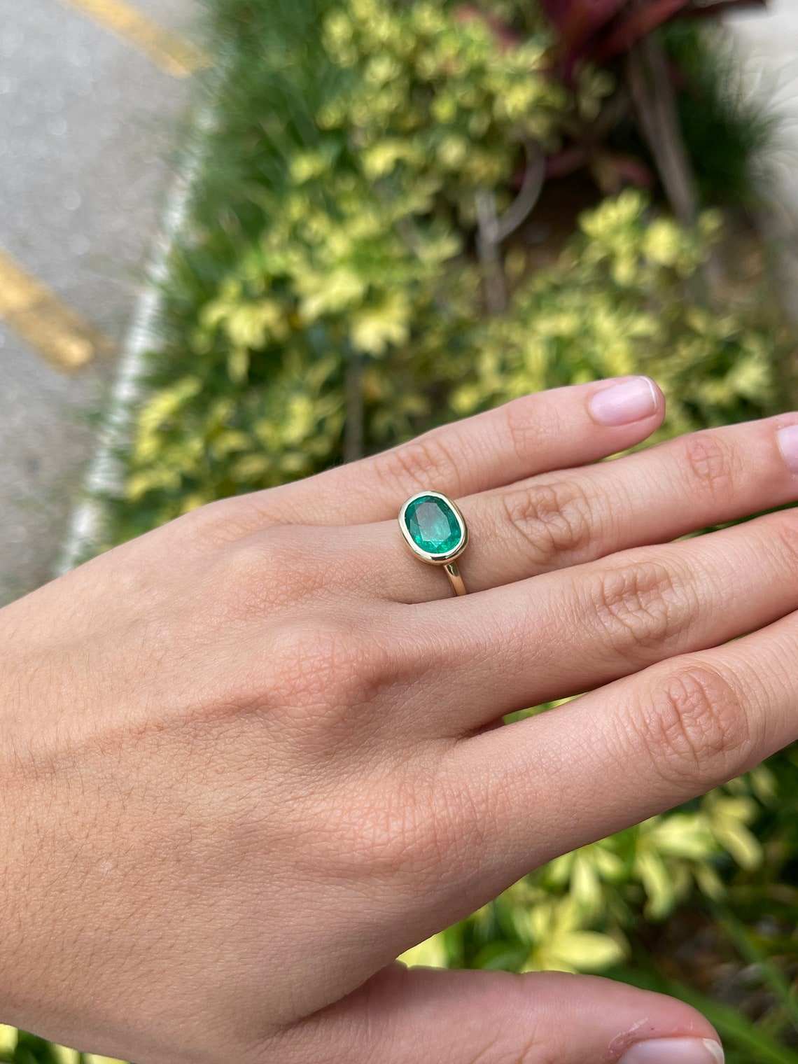 Oval Emerald Solitaire East to West Ring