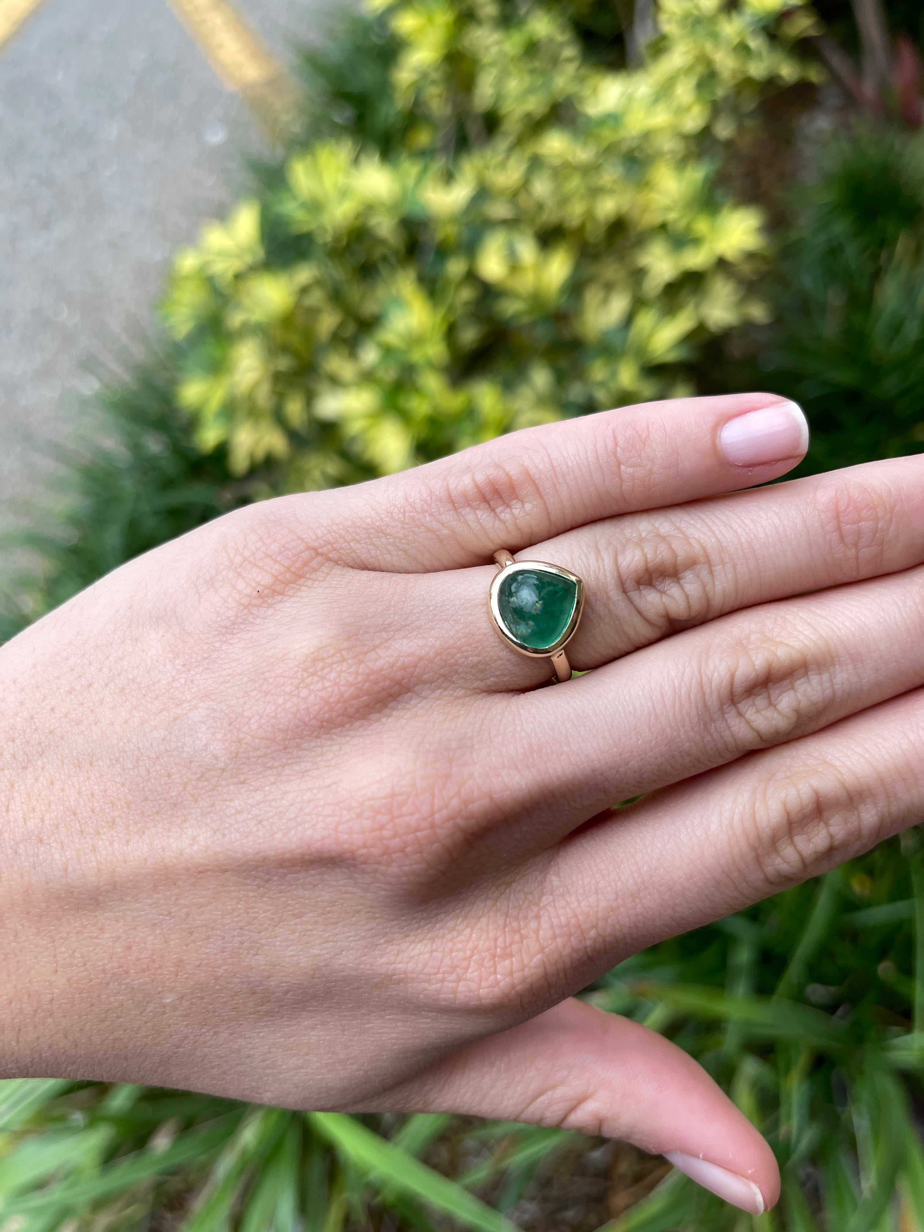 5.56cts Bezel Set Trillion Cut Cabochon