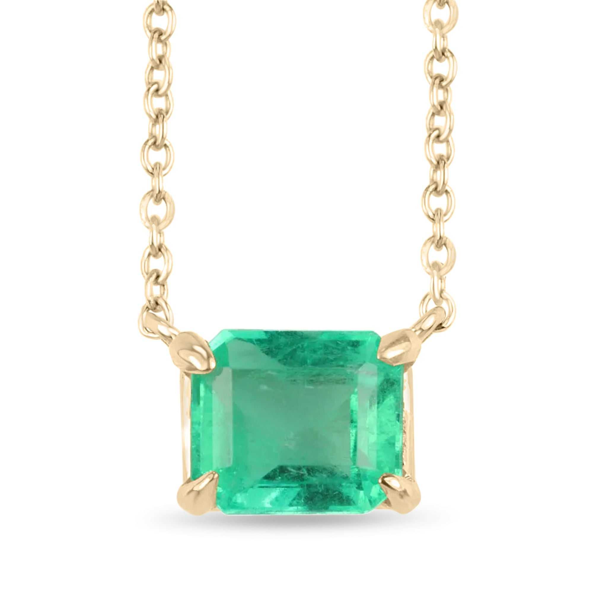1.07 carat East to West emerald cut pendant necklace in 14K yellow gold with four-prong setting