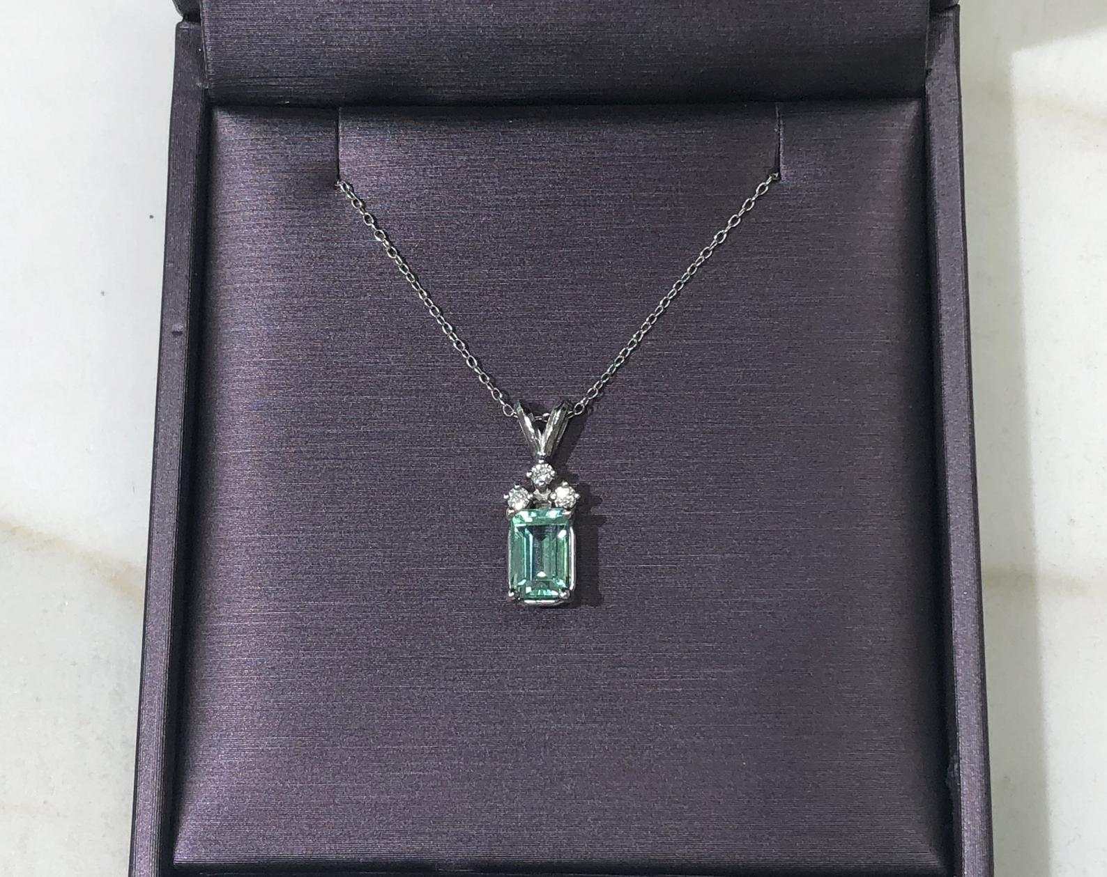 1.56tcw Petite Emerald-Emerald Cut & 3 Diamond Accent Necklace 14K