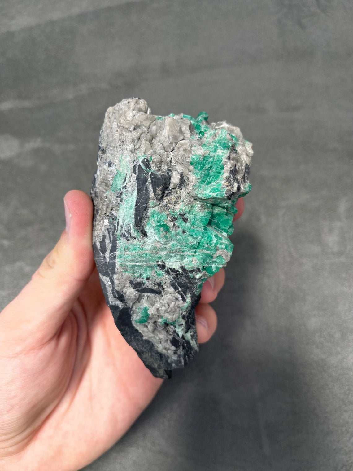 Exquisite Armadillo Crystal Carving with Colombian Emeralds