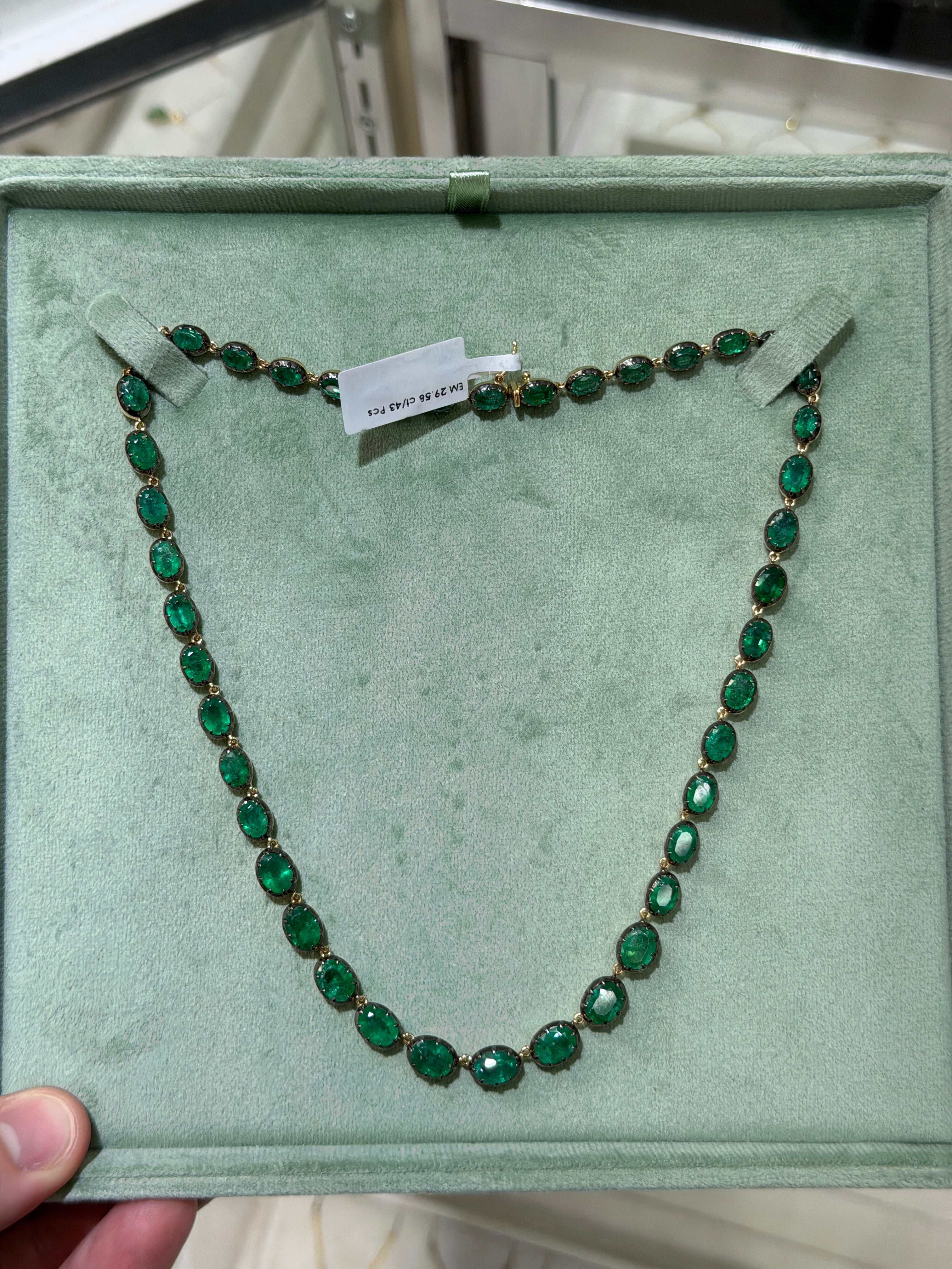 14K gold tennis necklace with oval cut black rhodium buttons and 29.58tcw natural gemstones, 17-inch length by JR Colombian Emeralds