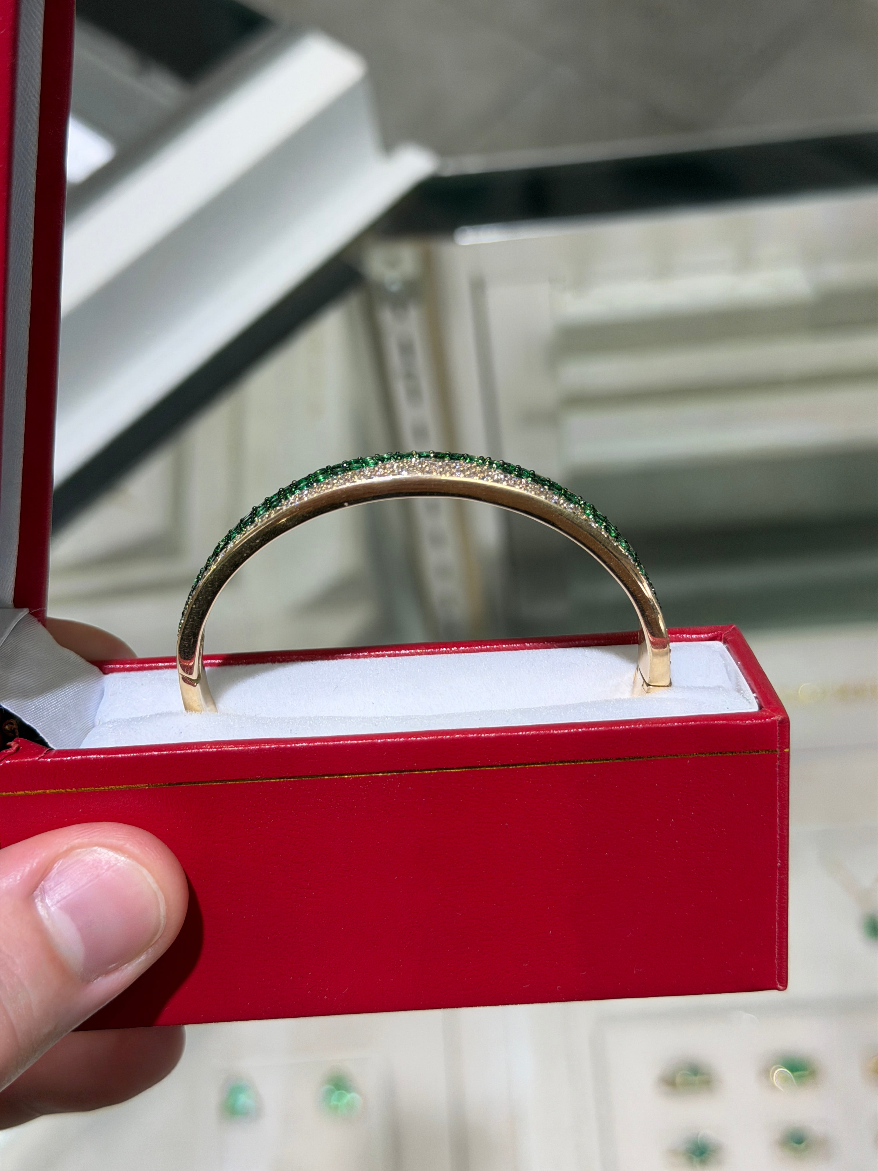 14K gold emerald and diamond ombre bangle bracelet with black and green rhodium, featuring natural emeralds and sparkling diamonds.