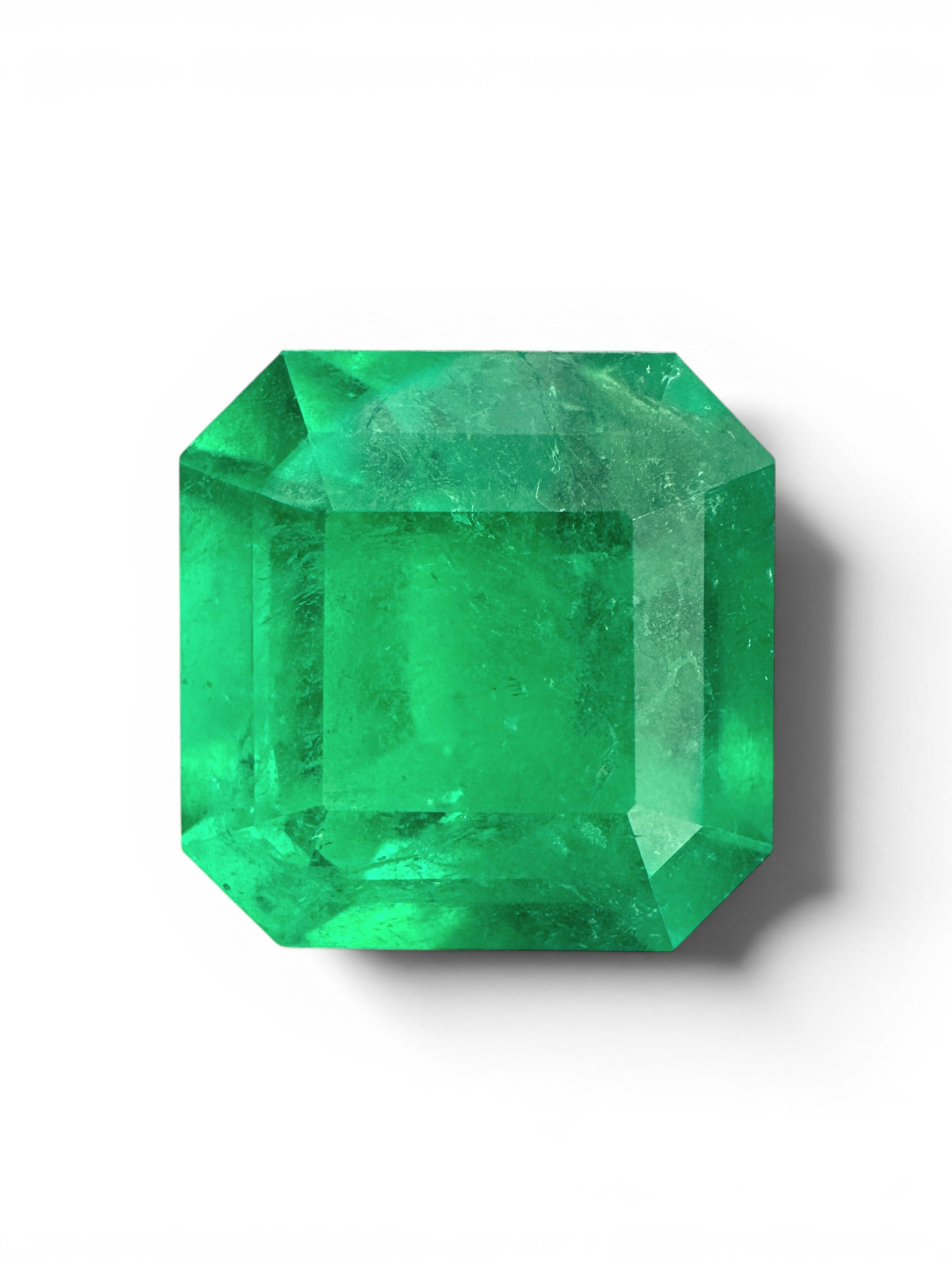 4.35-carat Kyptonite glow Colombian emerald Asscher cut loose gemstone from JR Colombian Emeralds, showcasing vibrant green color.