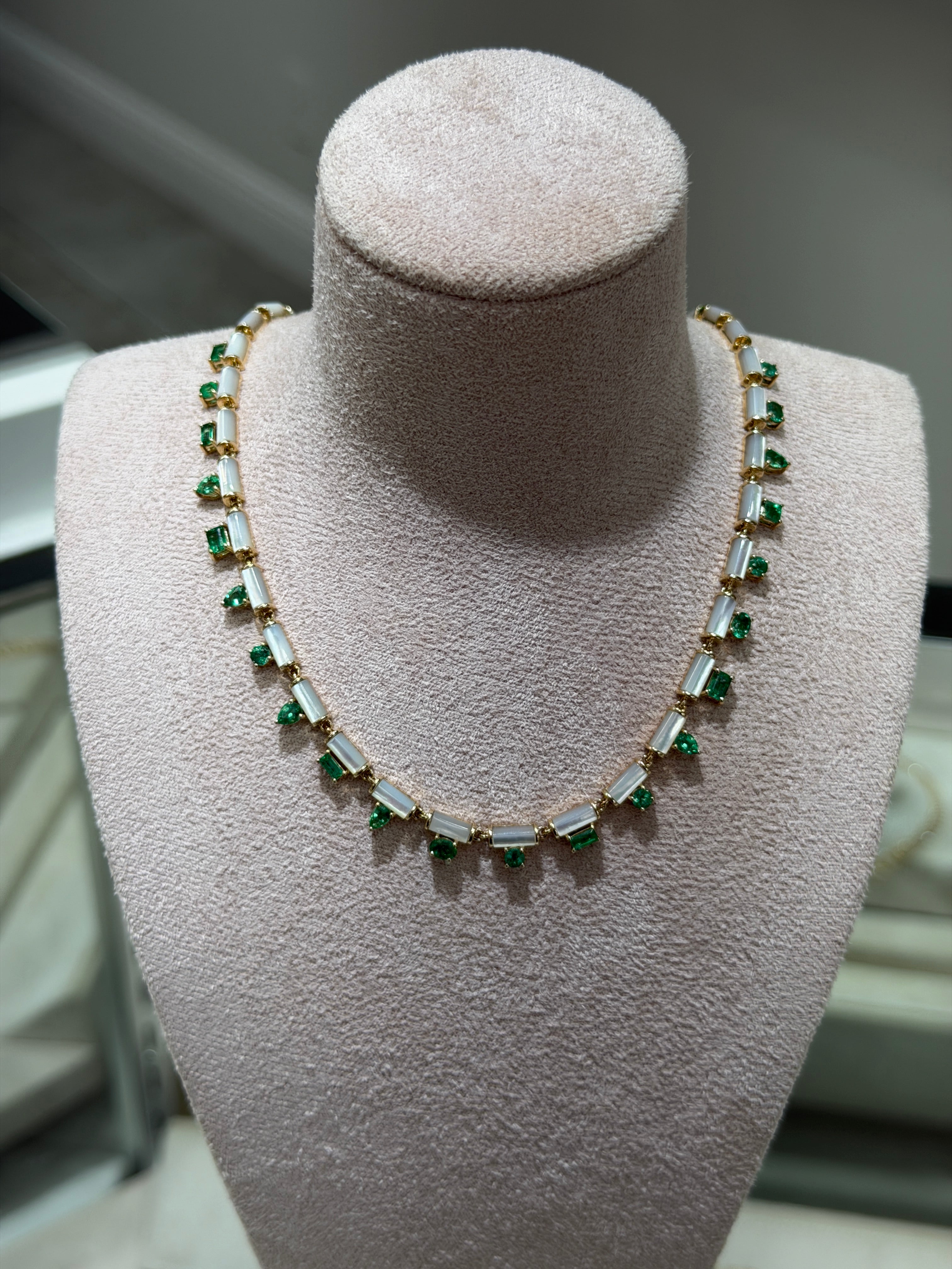 14K natural mix-cut emeralds and mother of pearl fringe necklace, 18 inches, by JR Colombian Emeralds showing vibrant gemstones.