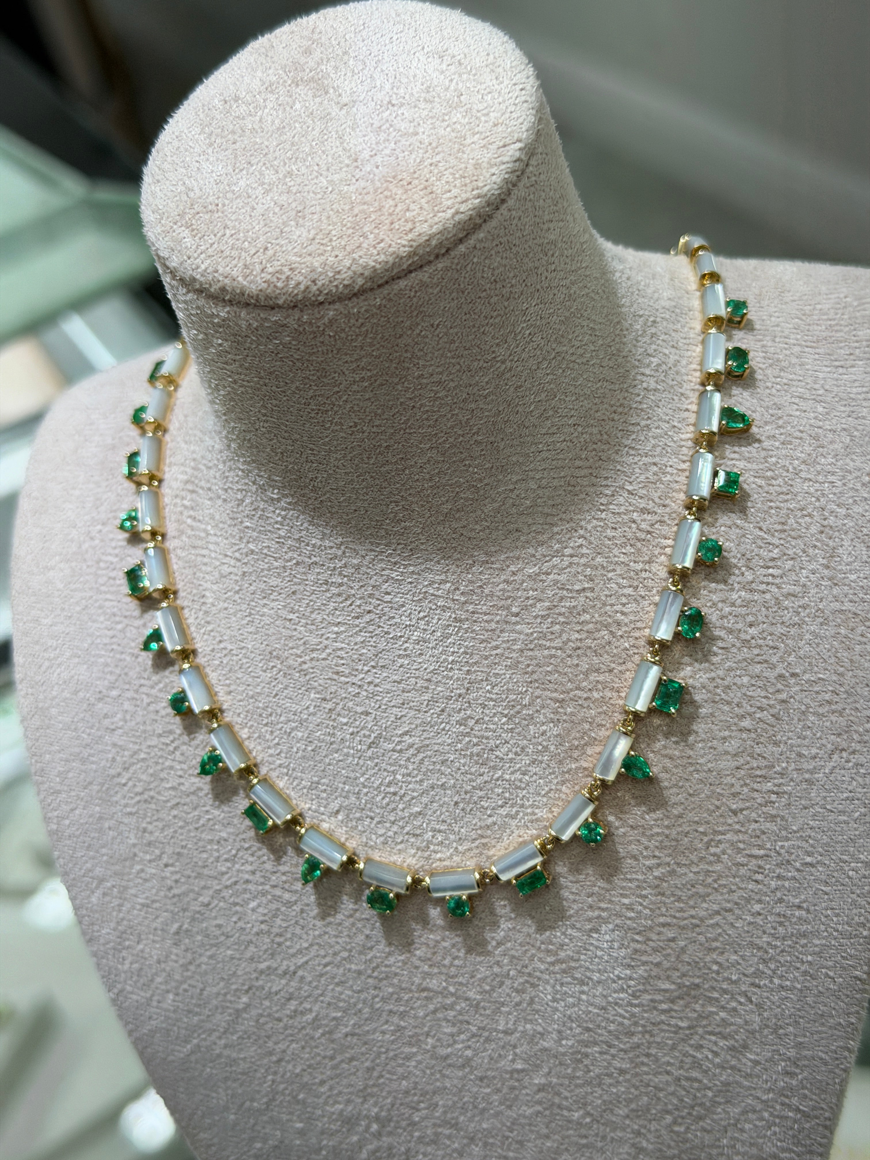 14K natural emerald and mother of pearl fringe necklace featuring mixed cut emeralds, 18-inch length by JR Colombian Emeralds.