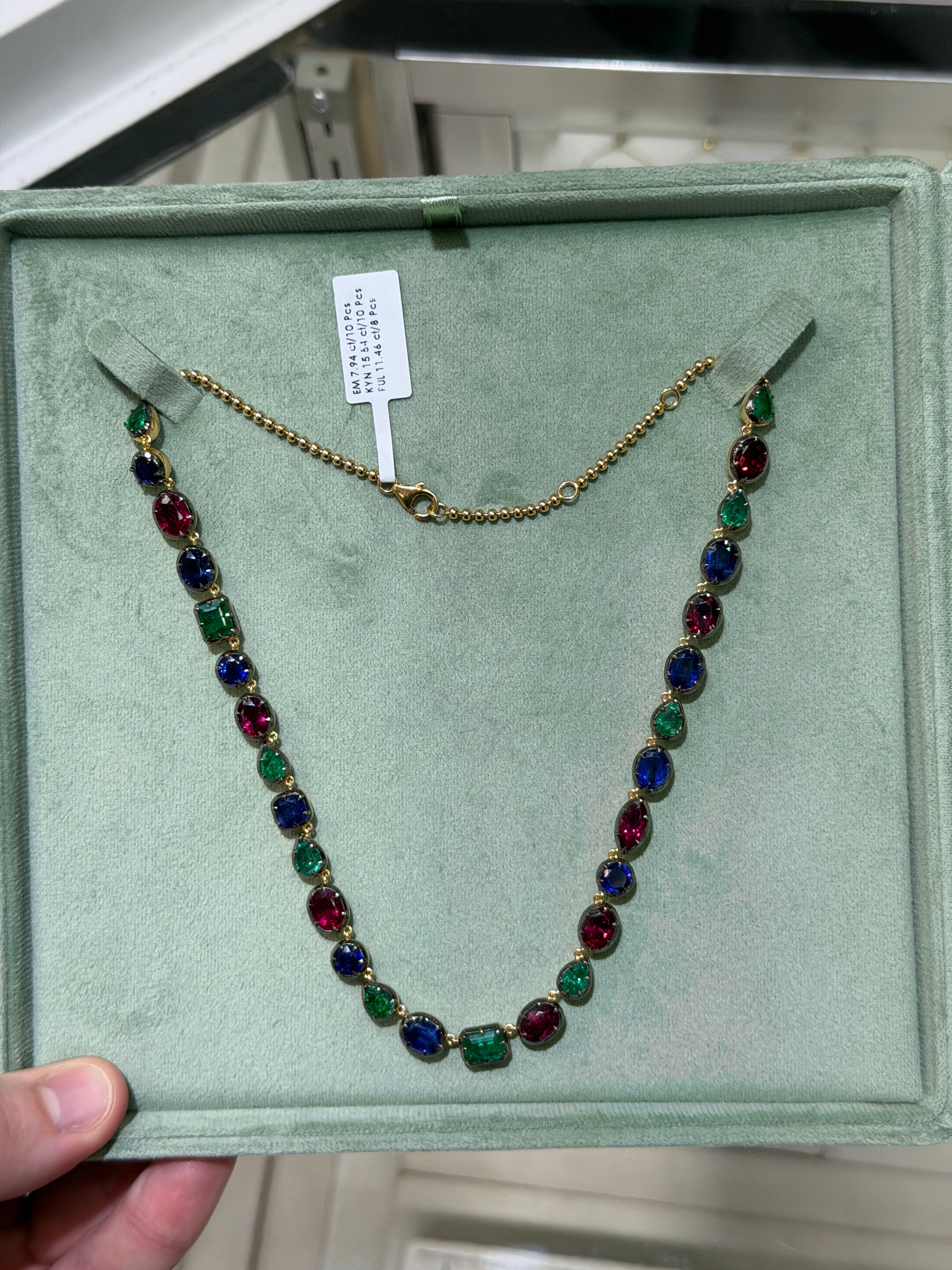 Elegant 17-inch necklace featuring 34.94tcw natural emerald, ruby, and kyanite gemstones on a 925 silver chain by JR Colombian Emeralds.
