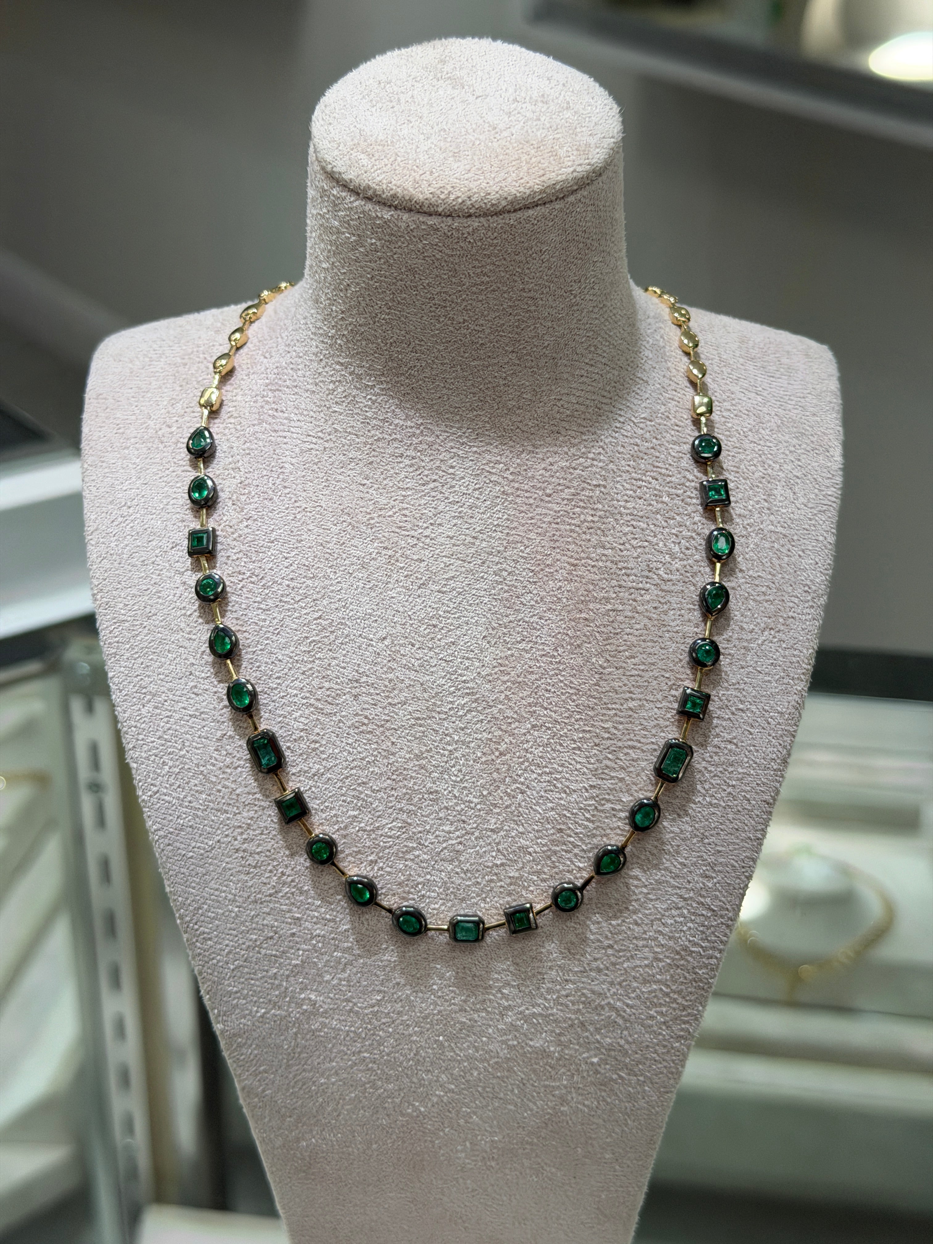 14K natural mix cut emerald tennis necklace with bezel setting and black rhodium finish, 18-inch length by JR Colombian Emeralds.