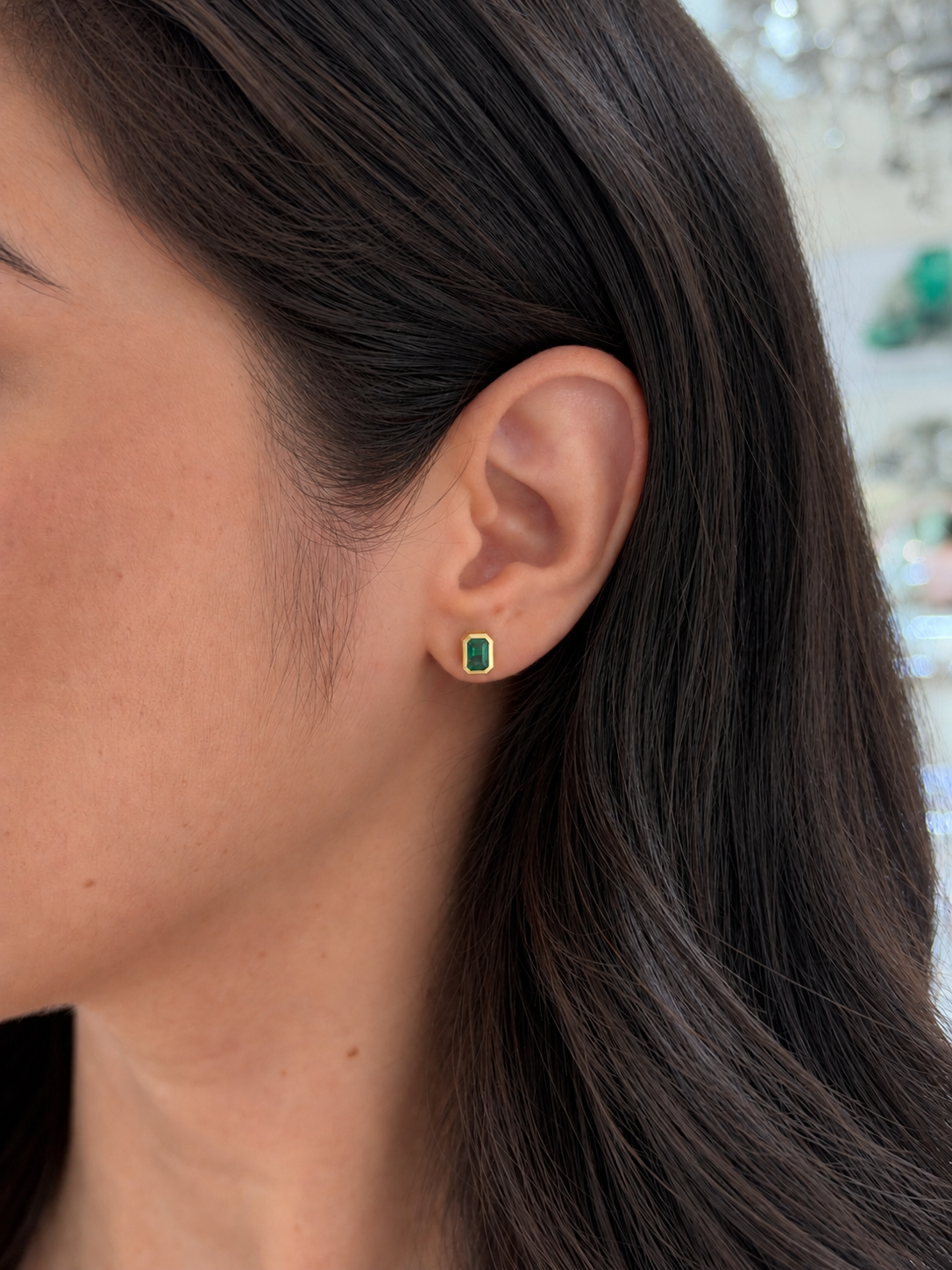 14K natural emerald stud earrings with bezel set emerald cut emeralds, featuring 1.20tcw from JR Colombian Emeralds.