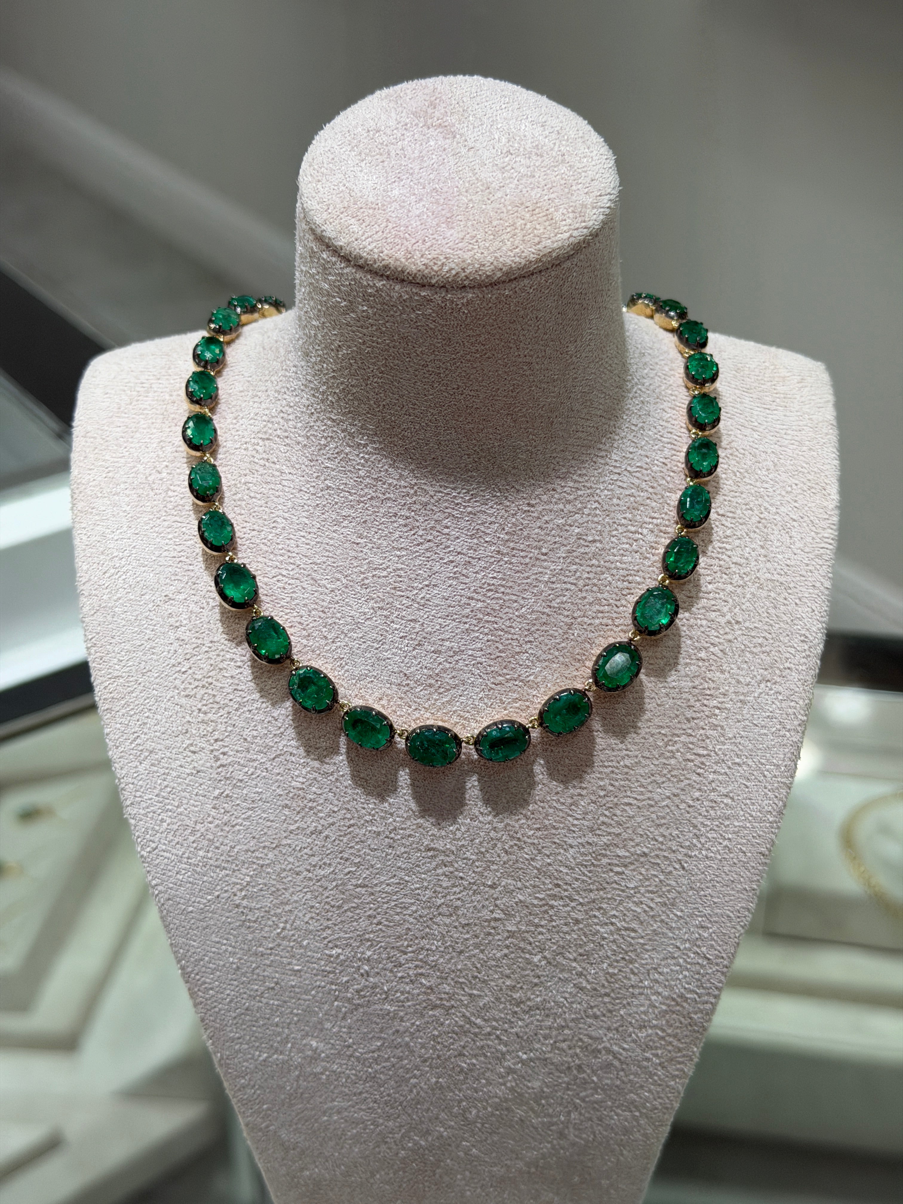 14K gold tennis necklace with natural oval cut diamonds totaling 29.58 carats, black rhodium finish, 17-inch length.