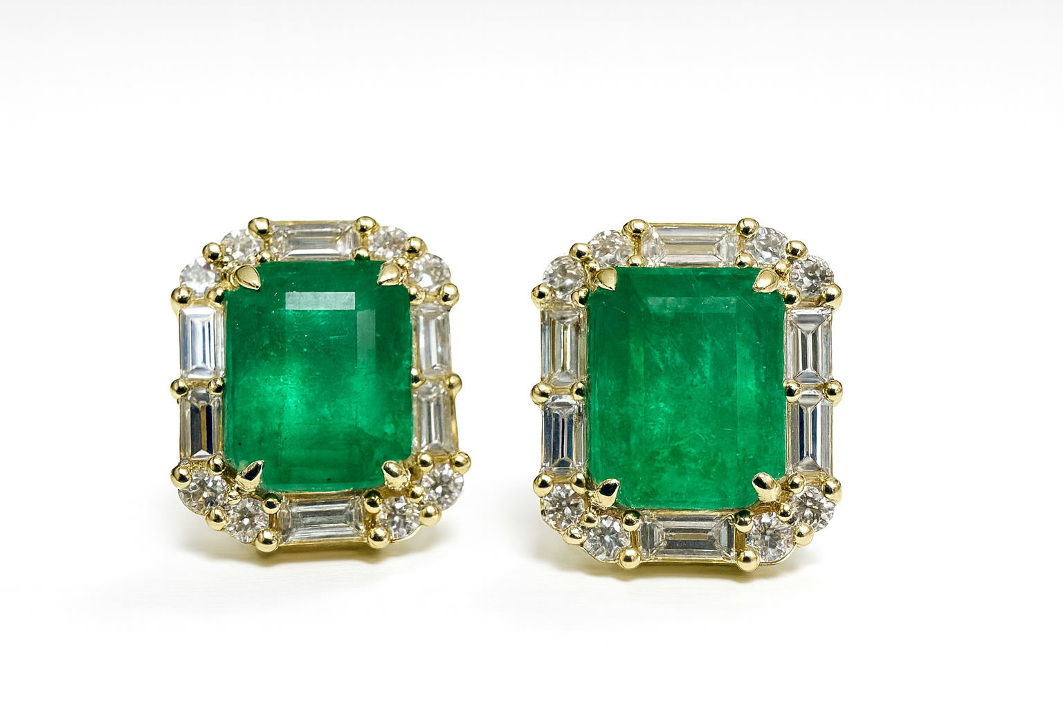 2.36tcw 18K yellow gold emerald cut rich green emerald stud earrings with baguette and round diamond halo