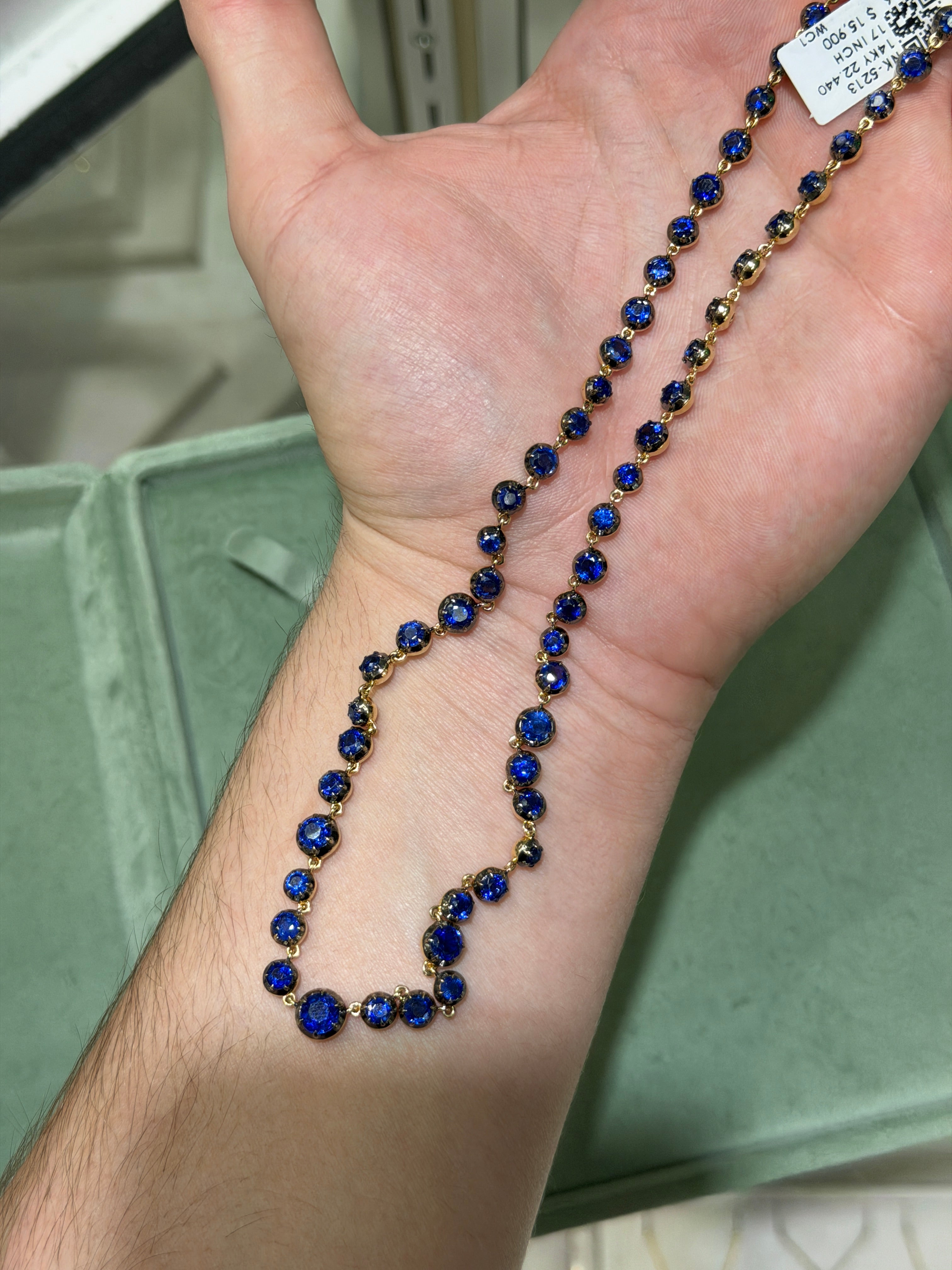 14K gold necklace with 20.87tcw deep blue round cut Kyanite gemstones and diamond clasp, 17-inch length by JR Colombian Emeralds.