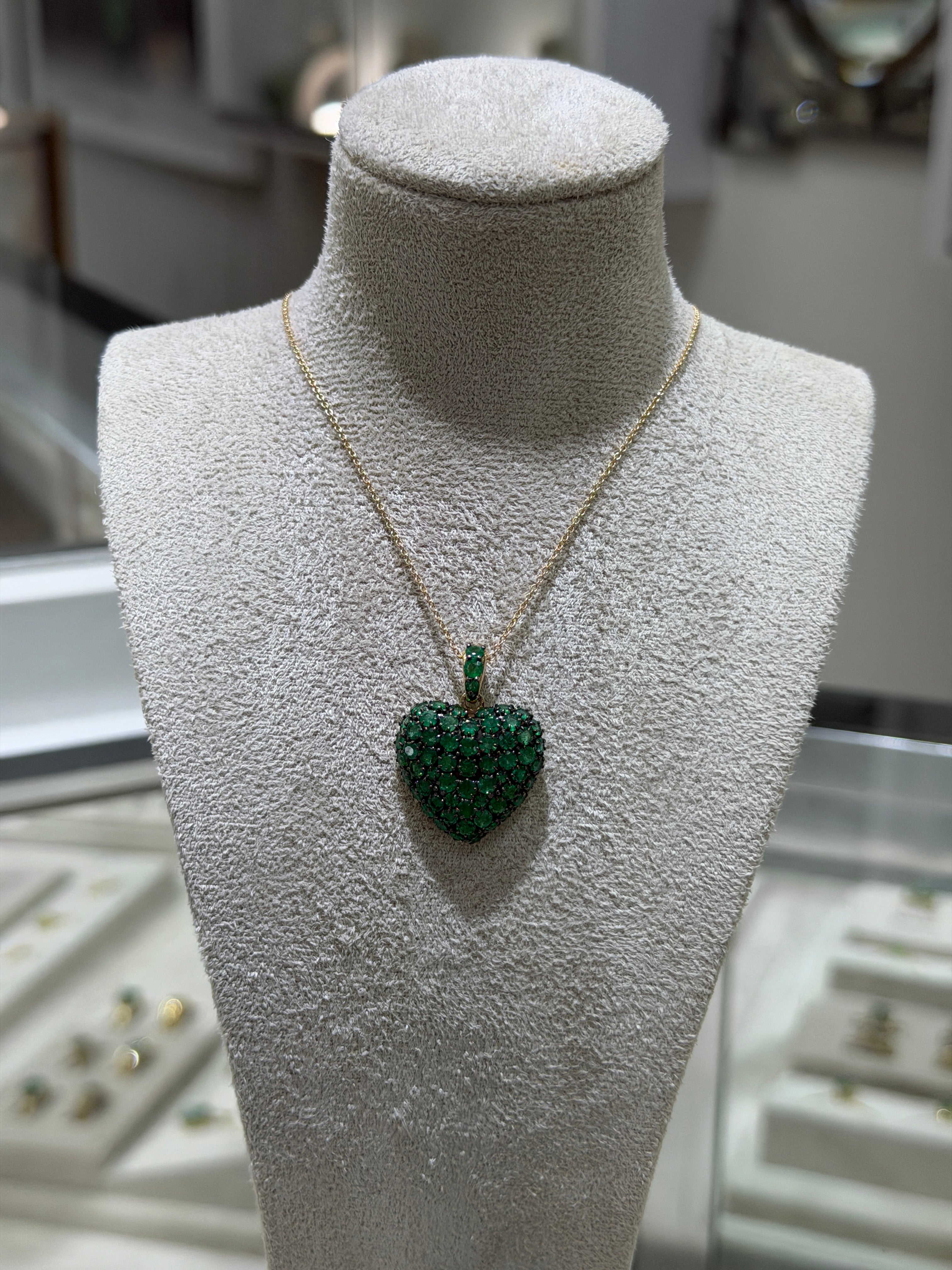 14K gold emerald cluster heart pendant with black rhodium, 4.73 carats, by JR Colombian Emeralds, featuring multi-prong setting.