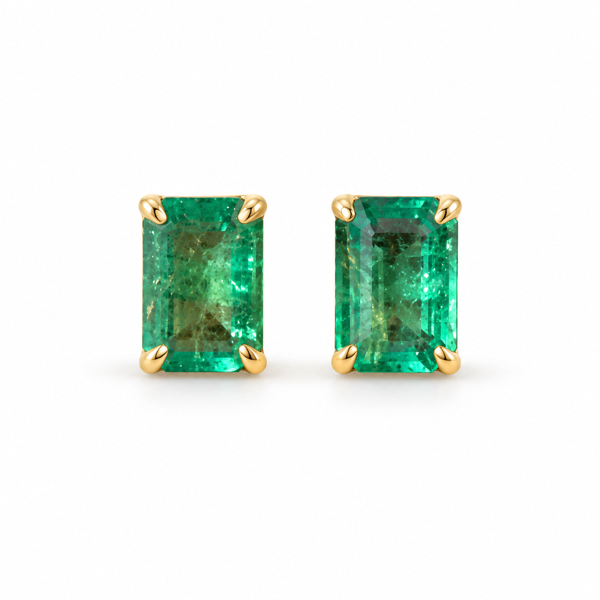 Medium green Zambian emerald cut stud earrings with 1.0 carats total weight in 14K gold, by JR Colombian Emeralds.