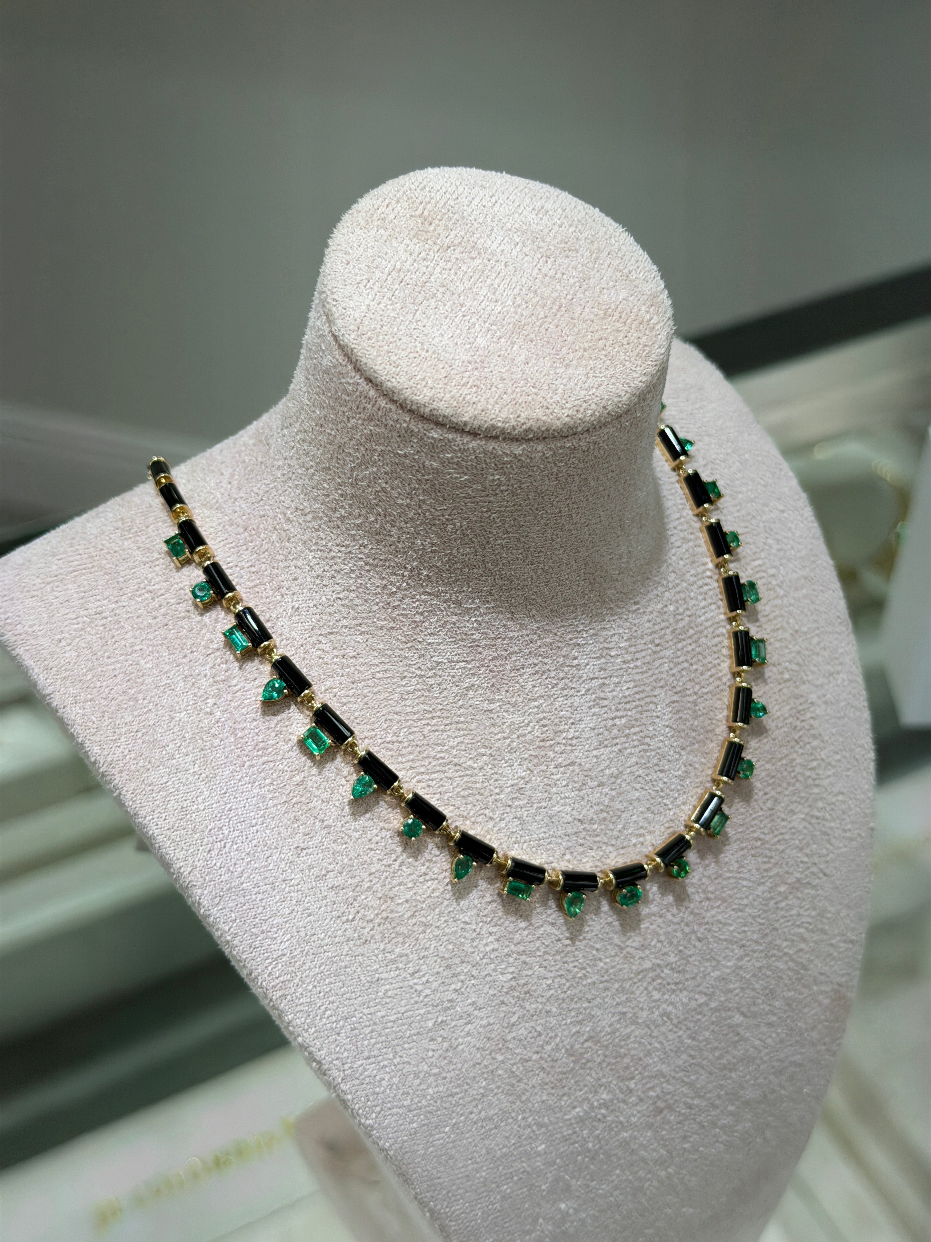 JR Colombian Emeralds 18-inch necklace featuring custom-cut onyx and natural emerald fringe in mixed shapes.