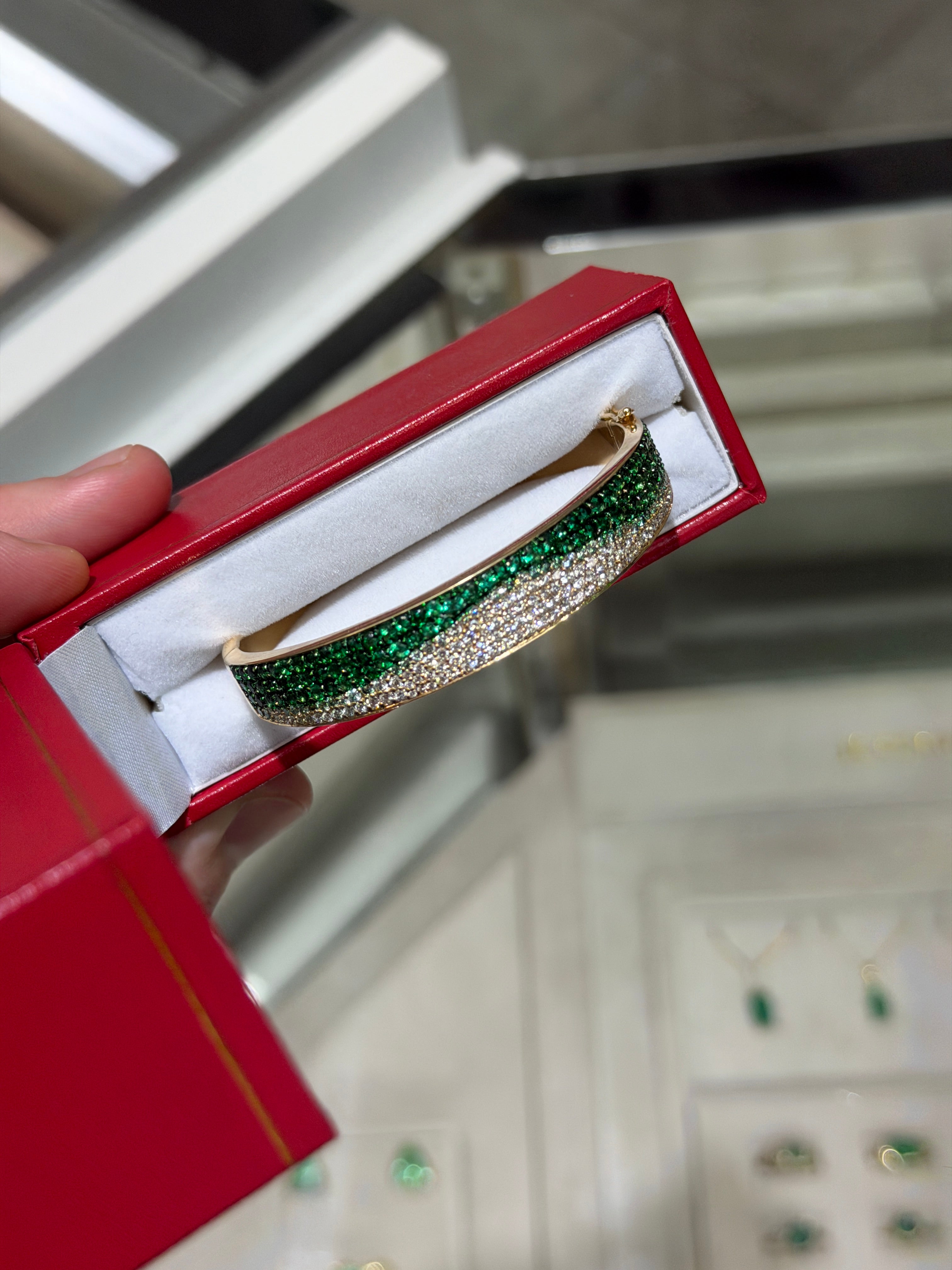 14K natural emerald and diamond ombre bangle bracelet by JR Colombian Emeralds with black and green rhodium finish.