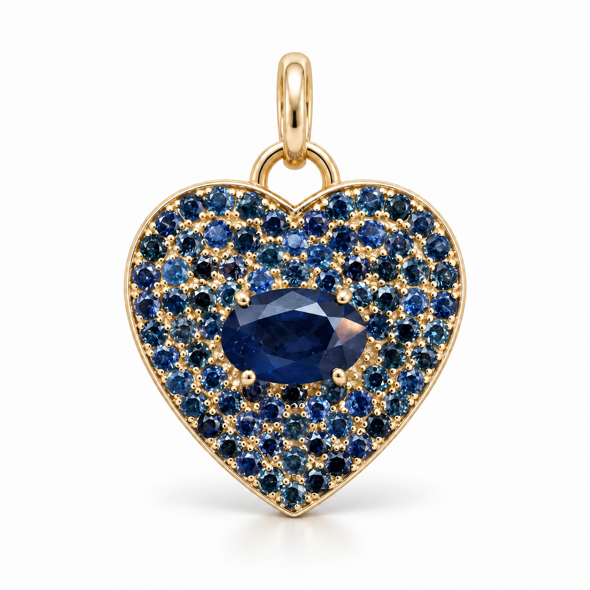 Heart-shaped 14K gold pendant with blue sapphire pave, 1.10tcw, from JR Colombian Emeralds featuring a elegant jewelry design.