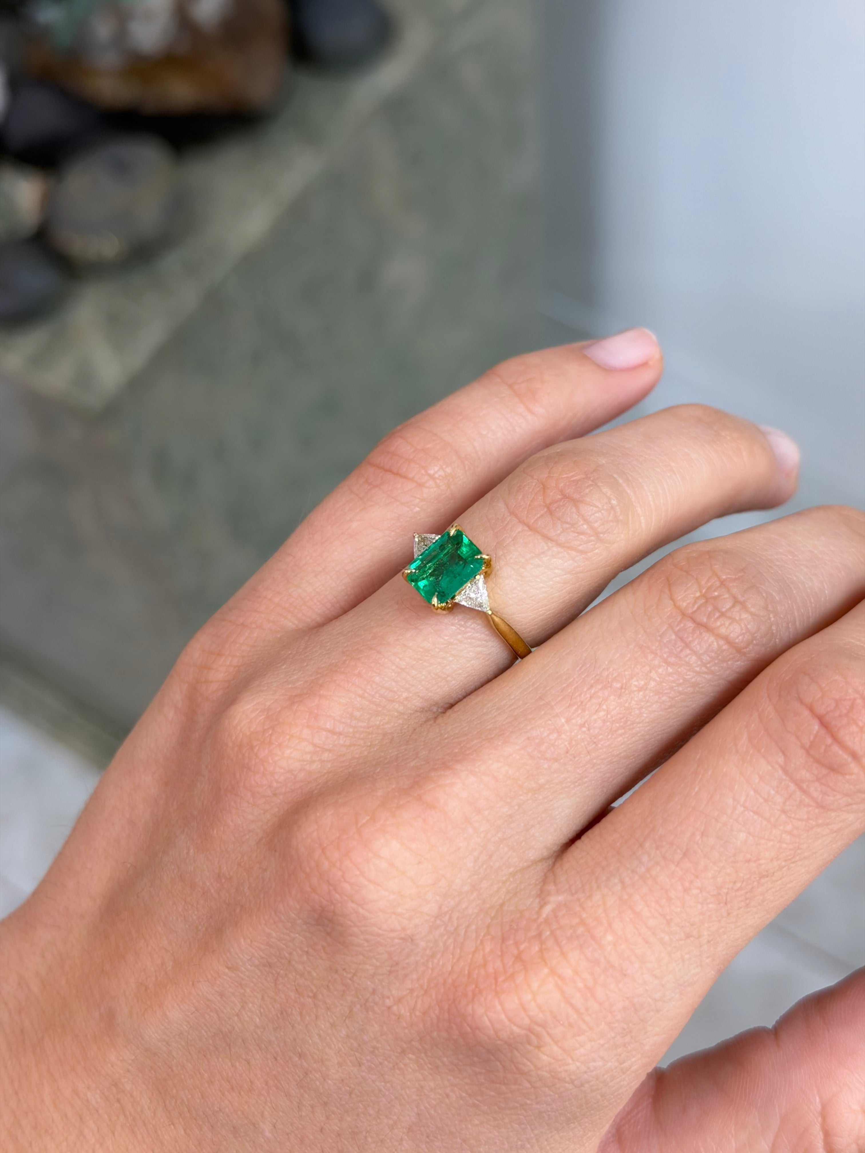 2.45tcw 18K Emerald Cut Emerald & Trillion Cut Diamond 3 Stone Prong Gold Ring