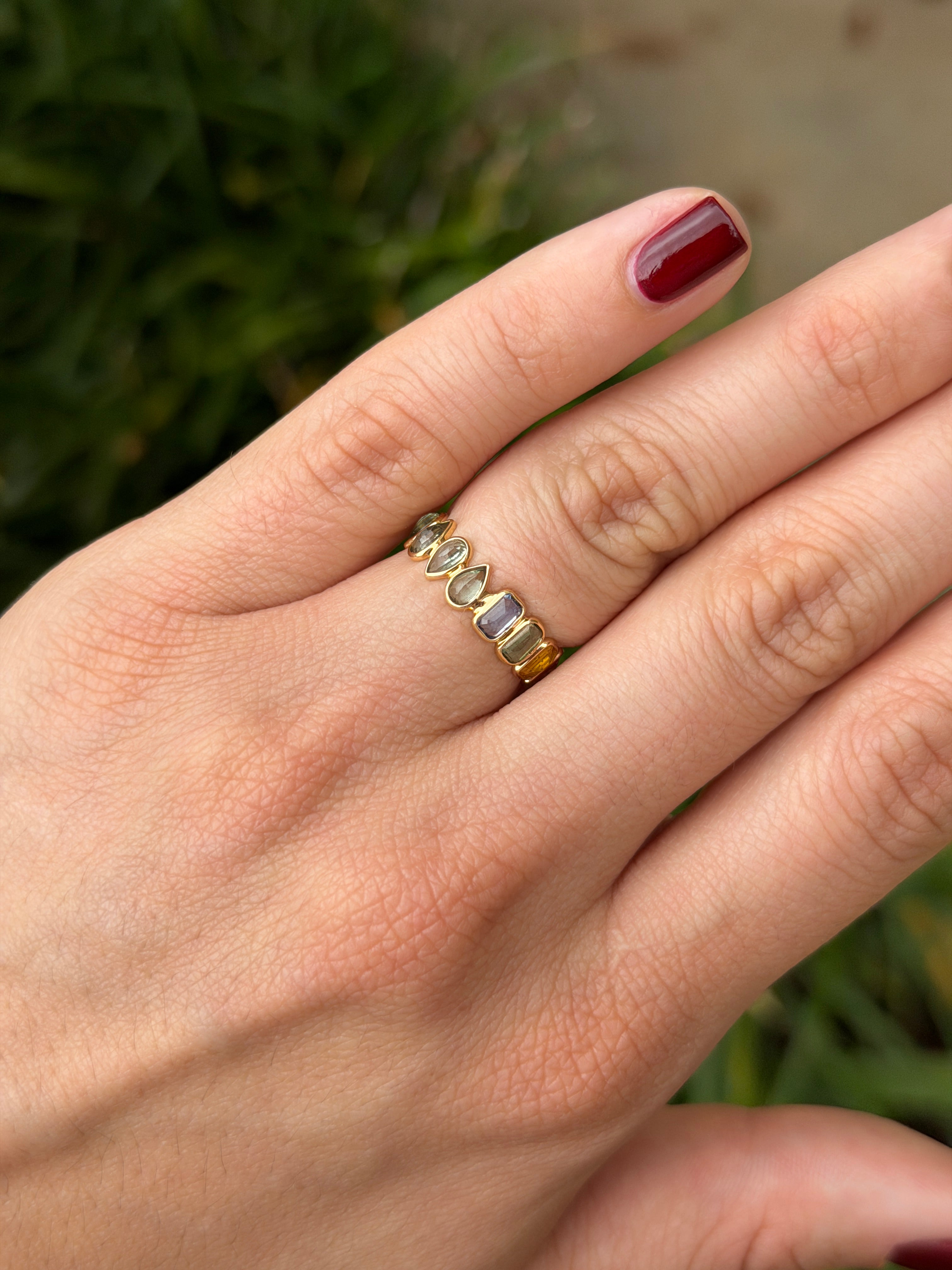 18K gold rainbow sapphire eternity band with pastel sapphires, low-profile design, size 6.5, by JR Colombian Emeralds.