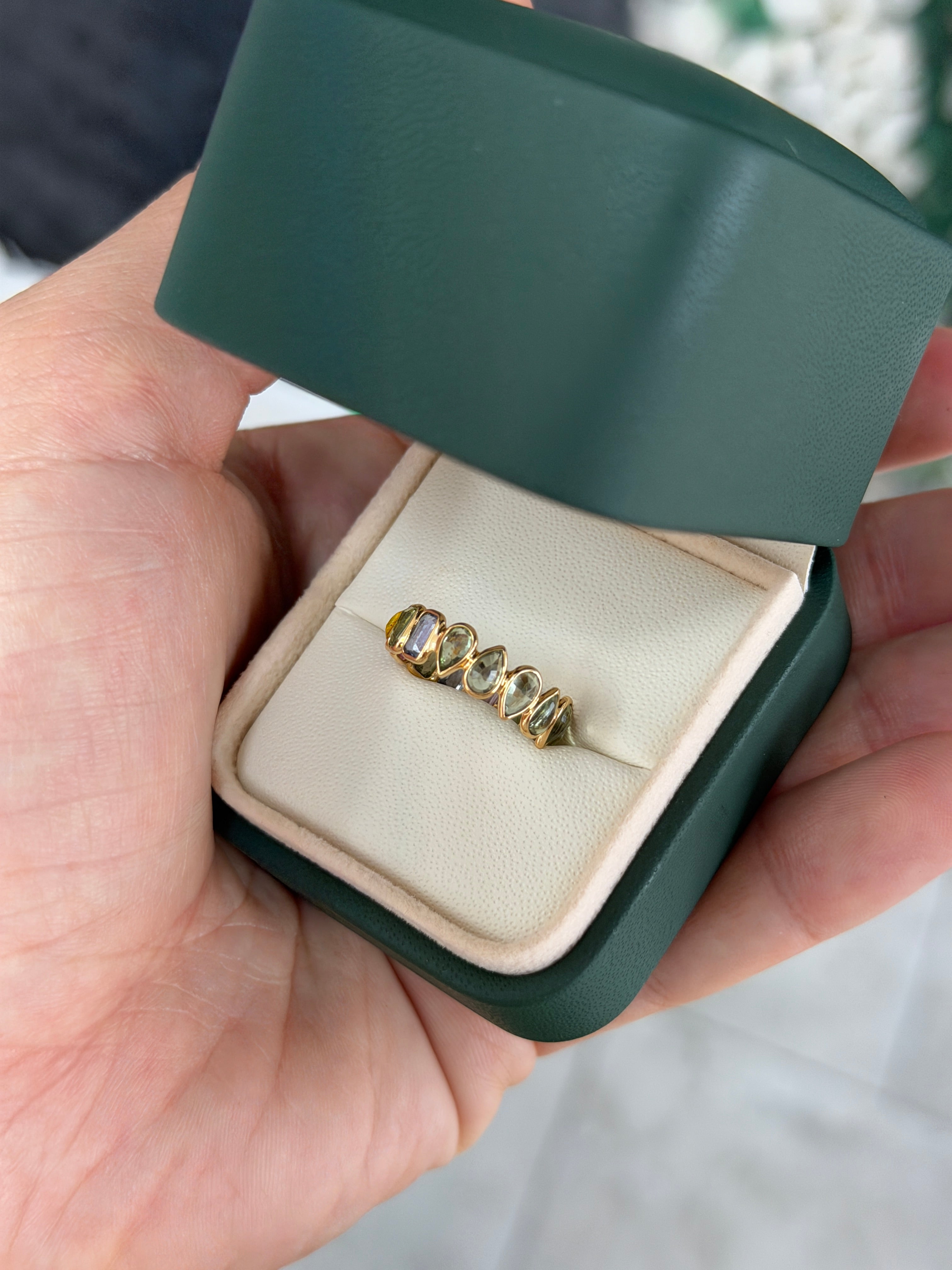 JR Colombian Emeralds pastel rainbow sapphire eternity band in 18K gold, featuring inverted sapphires and a low profile, size 6.5.