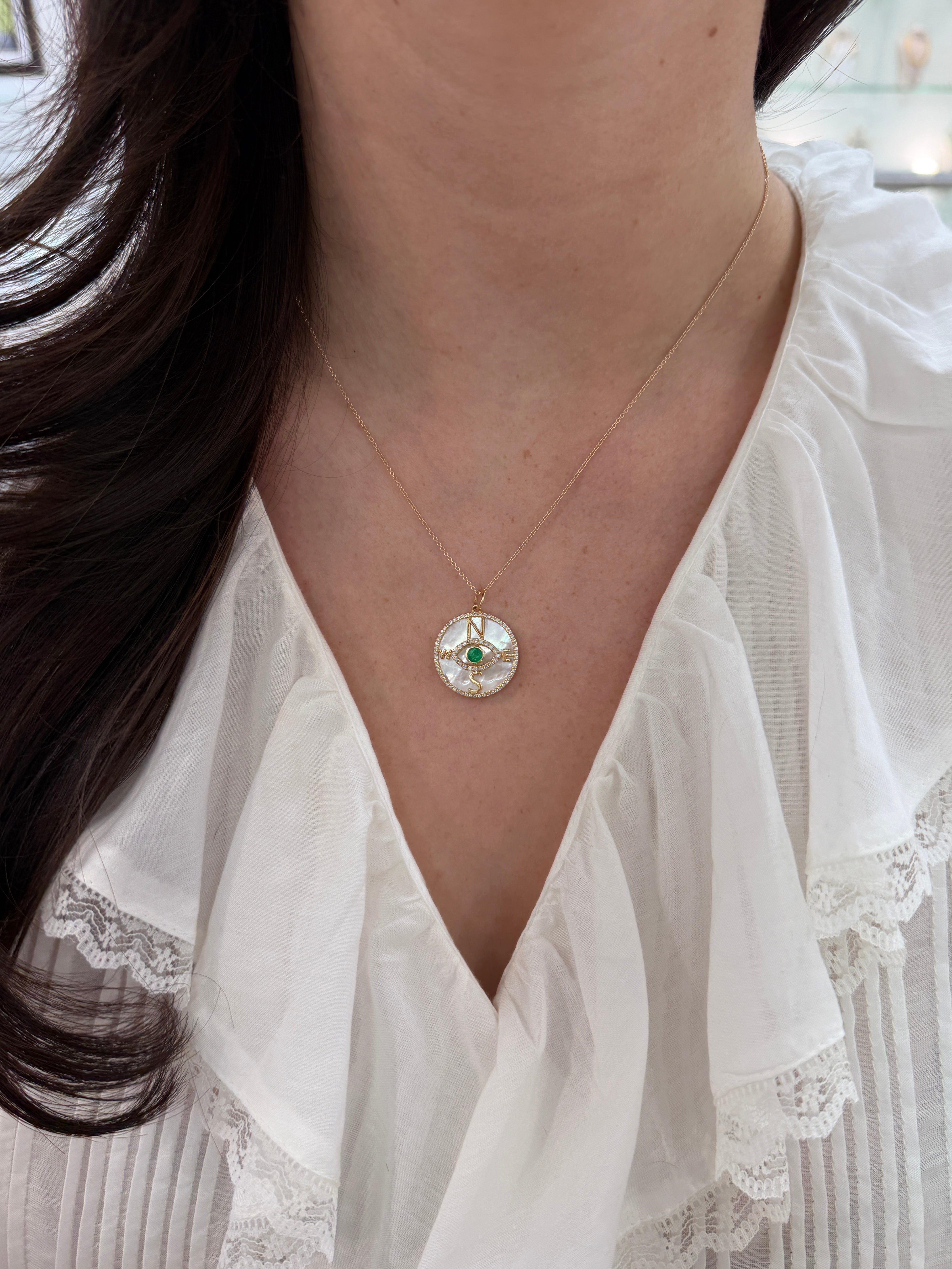 Natural round emerald and diamond evil eye pendant necklace with mother of pearl compass, 14K gold, by JR Colombian Emeralds.