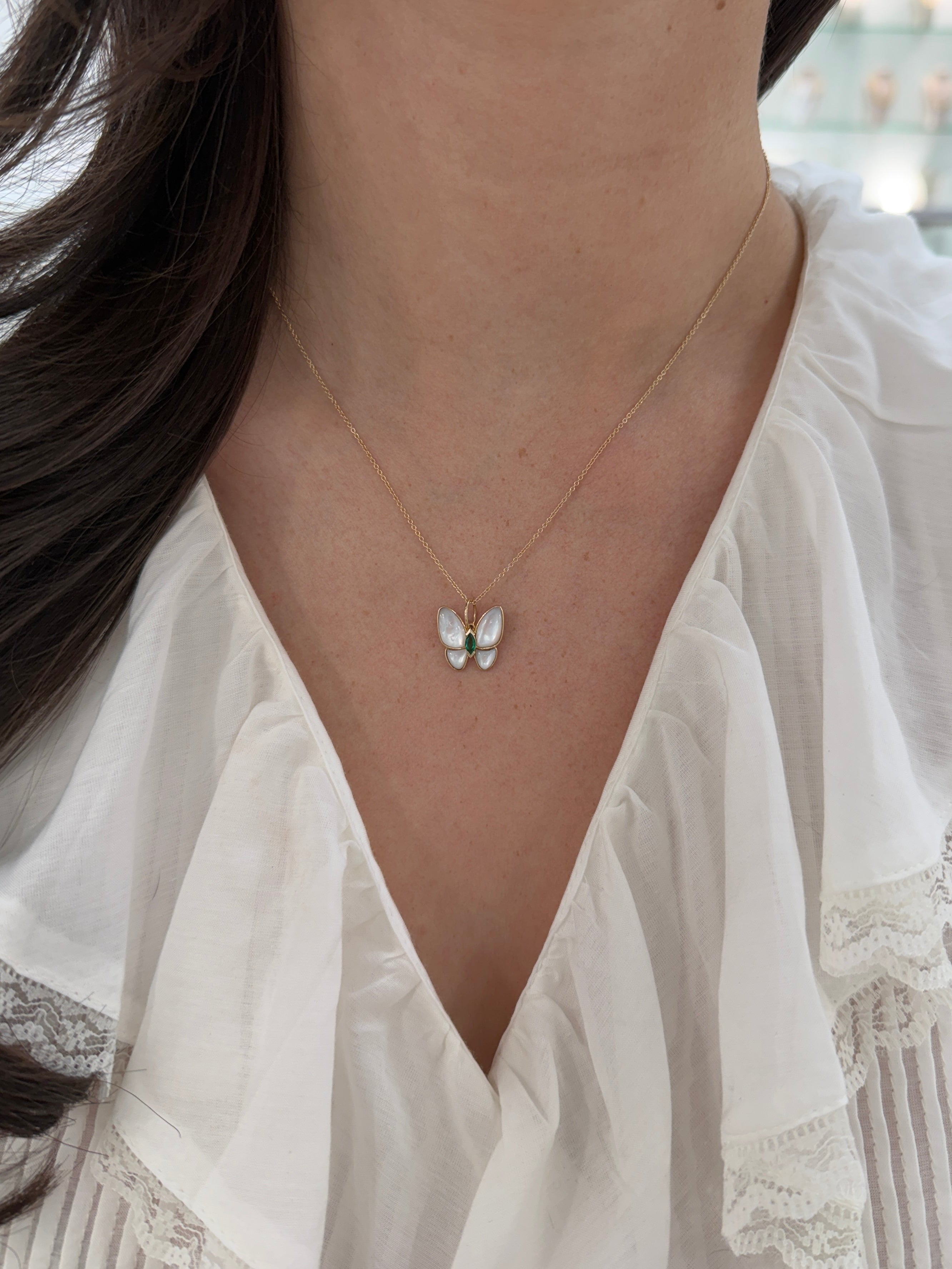 14K natural marquise emerald and mother of pearl butterfly pendant with 2.90tcw from JR Colombian Emeralds.