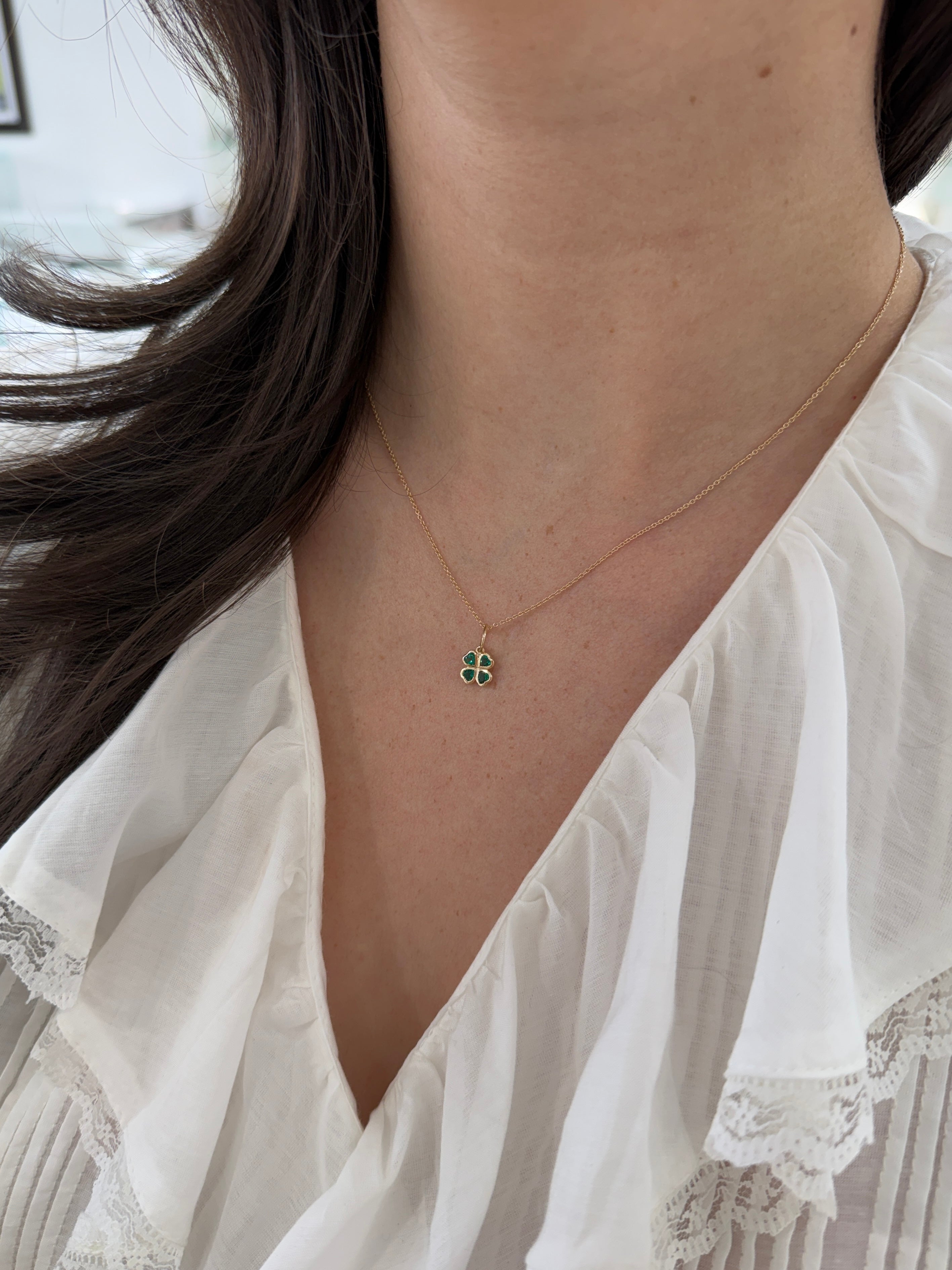 14K gold heart-shaped emerald clover charm pendant with 0.44tcw AAA+ quality gemstones, by JR Colombian Emeralds.