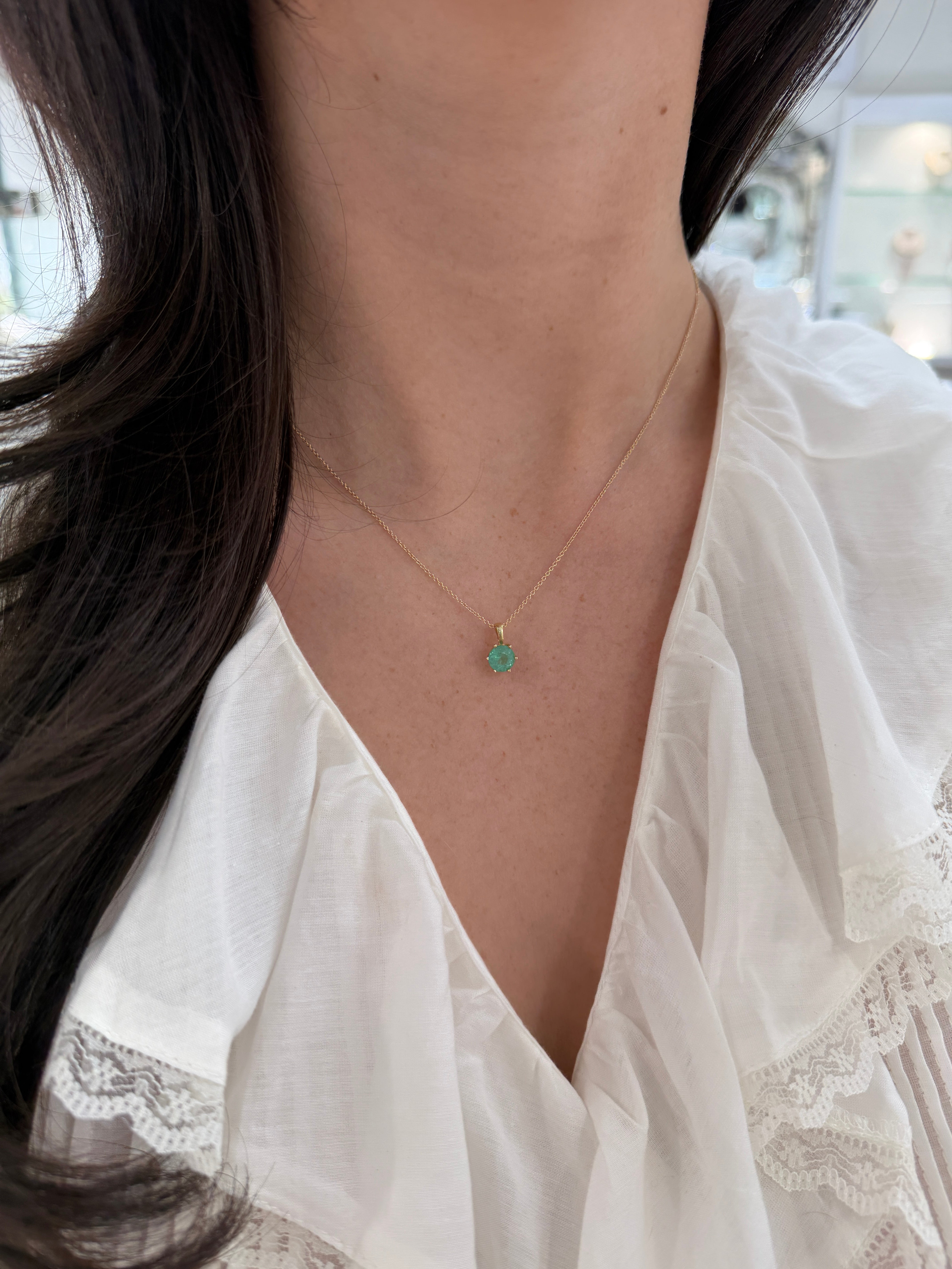 14K gold Tiffany-style emerald solitaire necklace with a 1.14 carat round emerald from JR Colombian Emeralds.