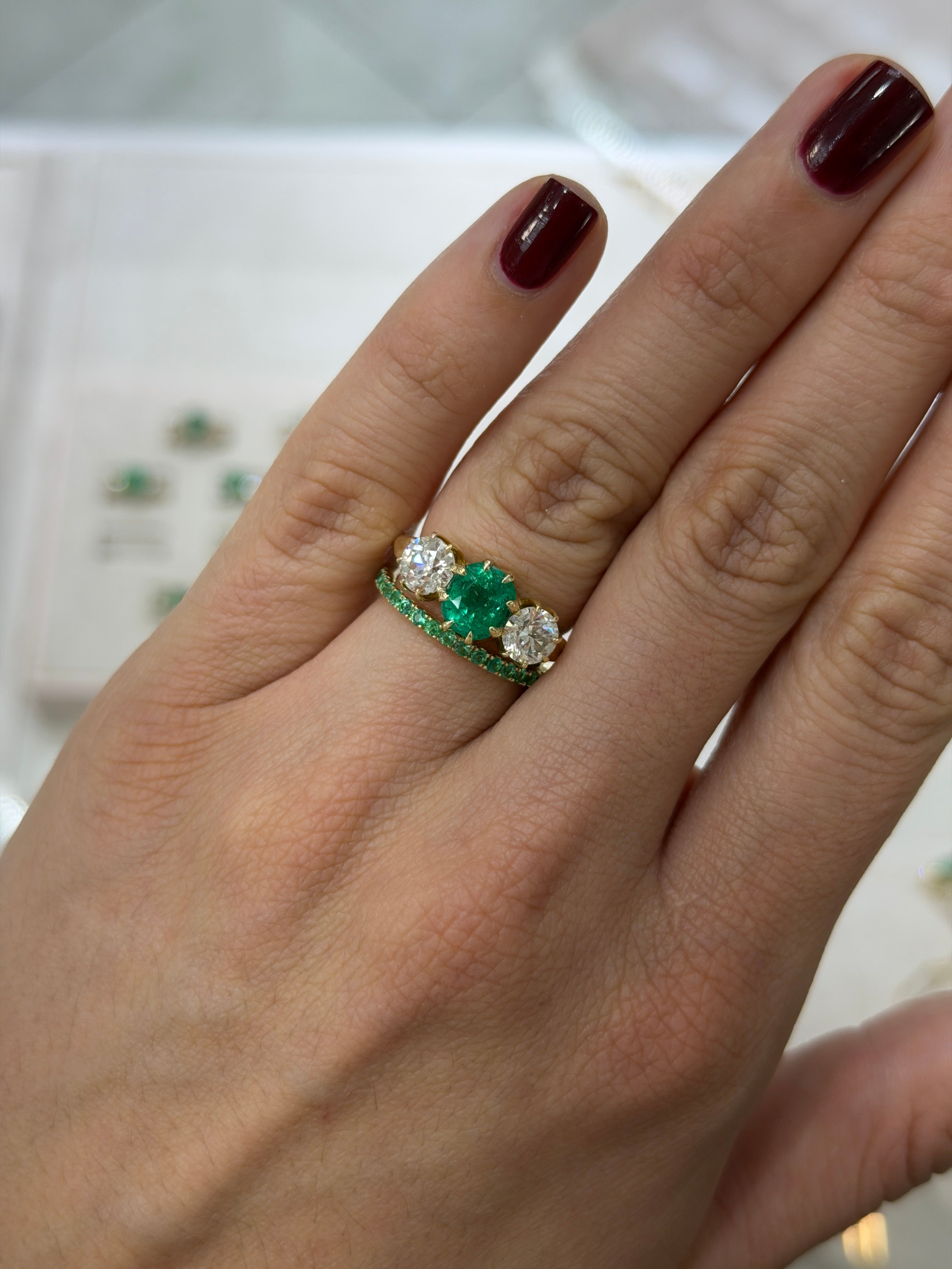 14K natural emerald eternity band with 0.70tcw from JR Colombian Emeralds, featuring alternating emerald gemstones in a continuous circle.