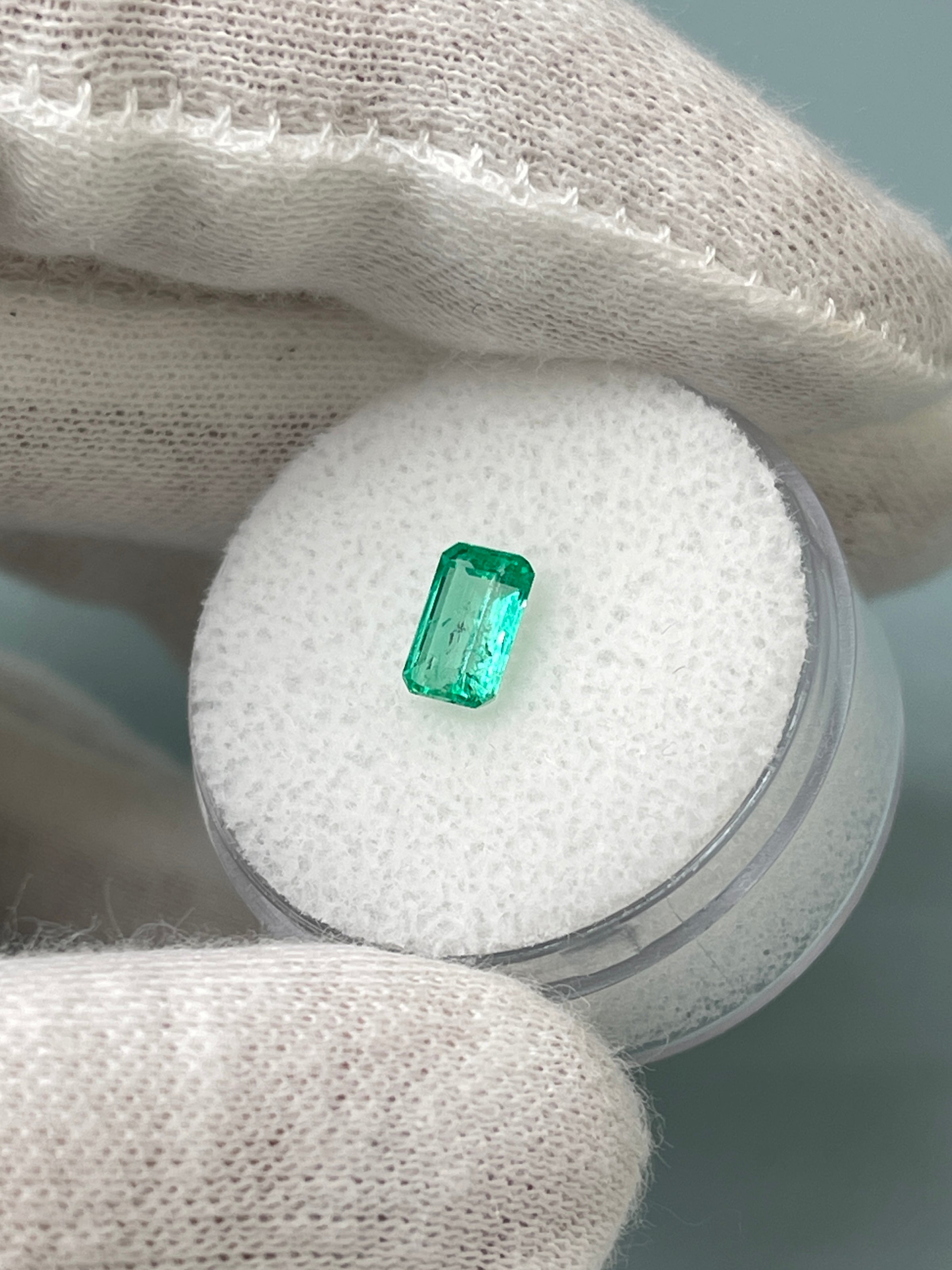 0.77 Carat 7x4.5 Glowy Loose Colombian Emerald-Emerald Cut