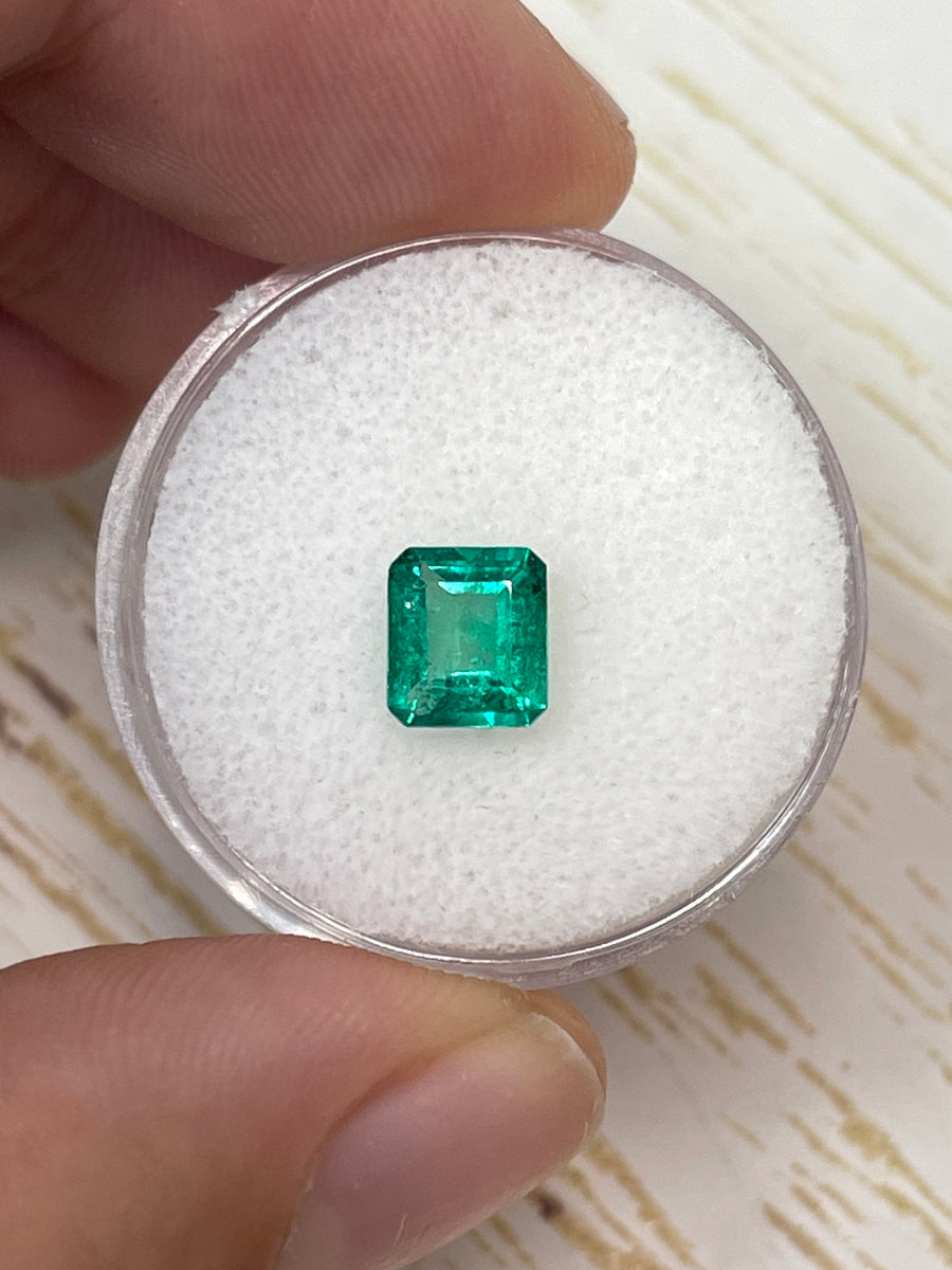 Emerald Cut Colombian Emerald: 0.90 Carat Vivid Green Loose Gemstone