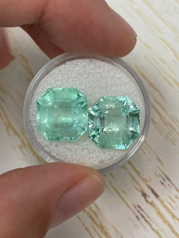 A Pair of Asscher Cut Loose Colombian Emeralds - 16.34 Total Carat Weight - Light Green Hue - Dimensions 12.2x12