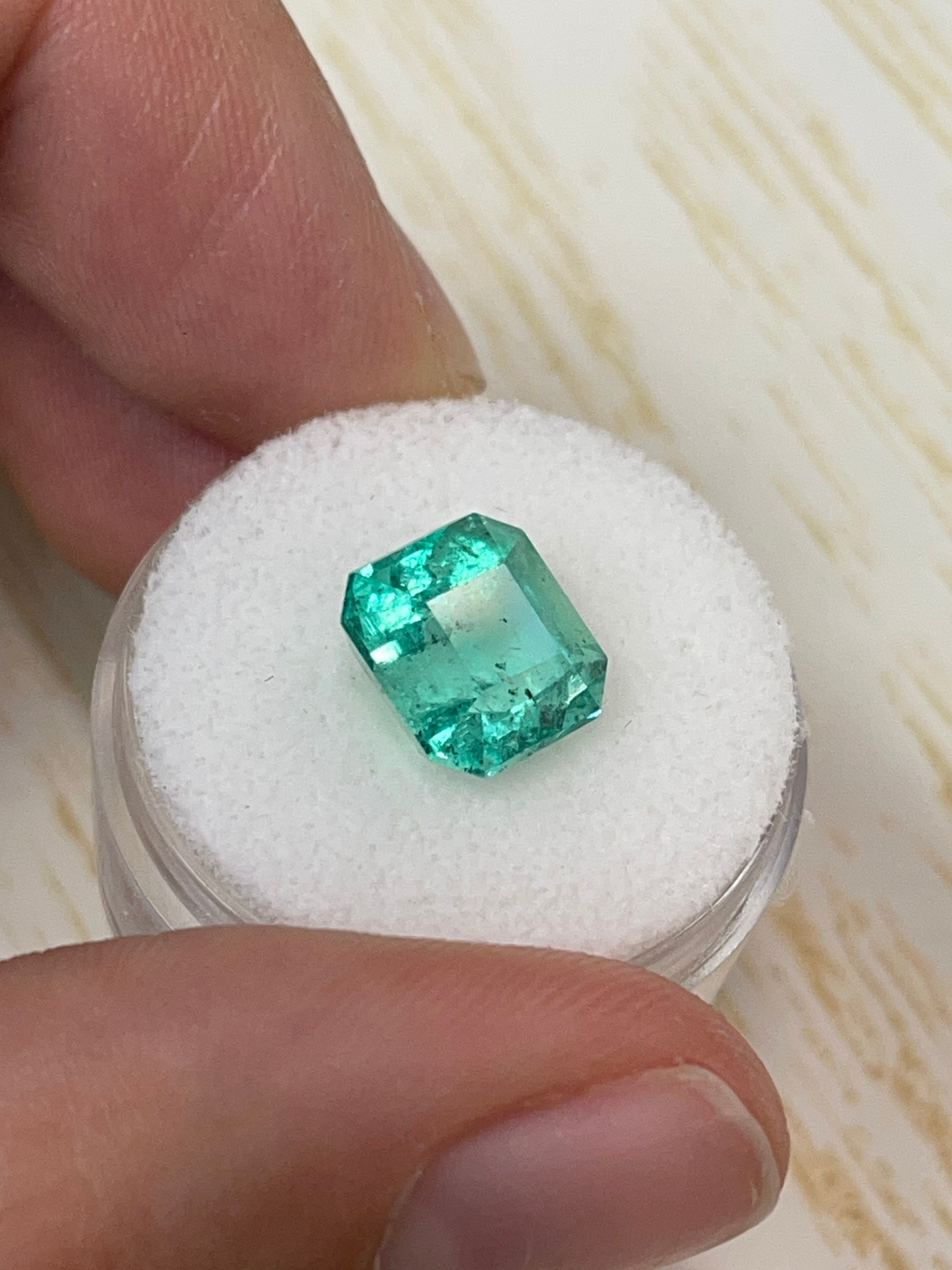 Exquisite 4.69 Carat Colombian Emerald - Asscher Cut with Distinctive Freckling and Clipped Corners