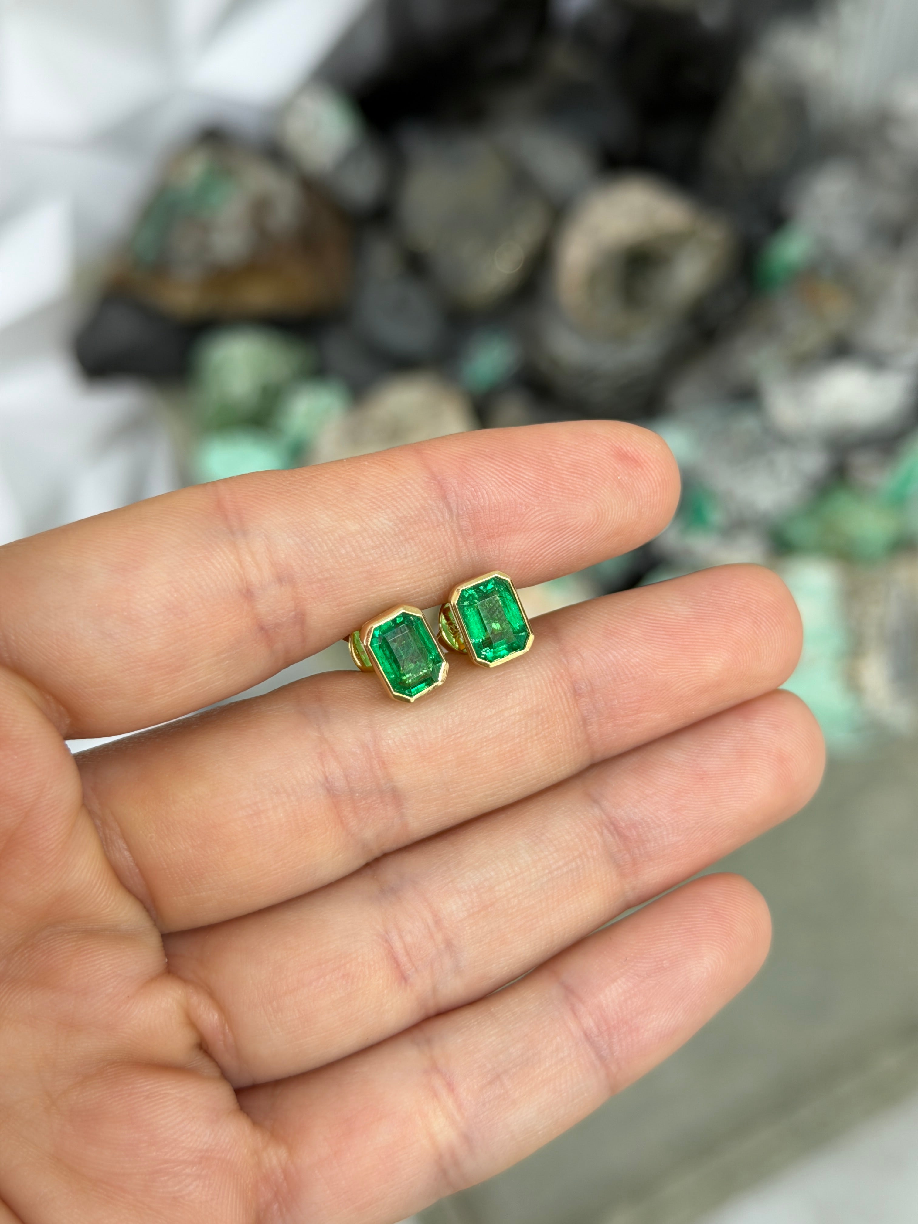 JR Colombian Emeralds 3.33tcw Angelina Jolie bezel set emerald stud earrings in 18K gold, showcasing vibrant green gemstones.