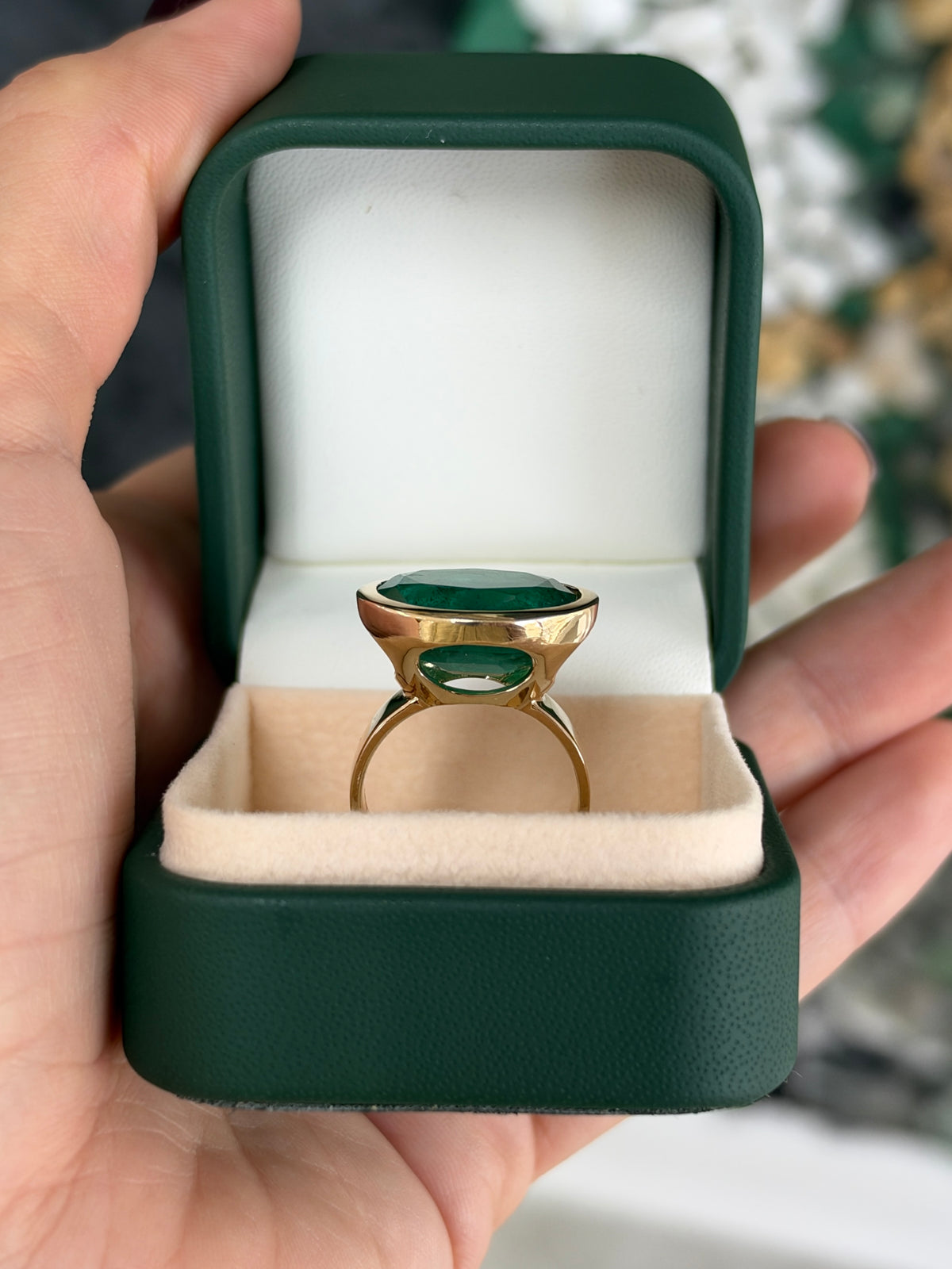 12.61ct 18K East to West Oval Emerald Bezel 5.7mm Wide Band Ring