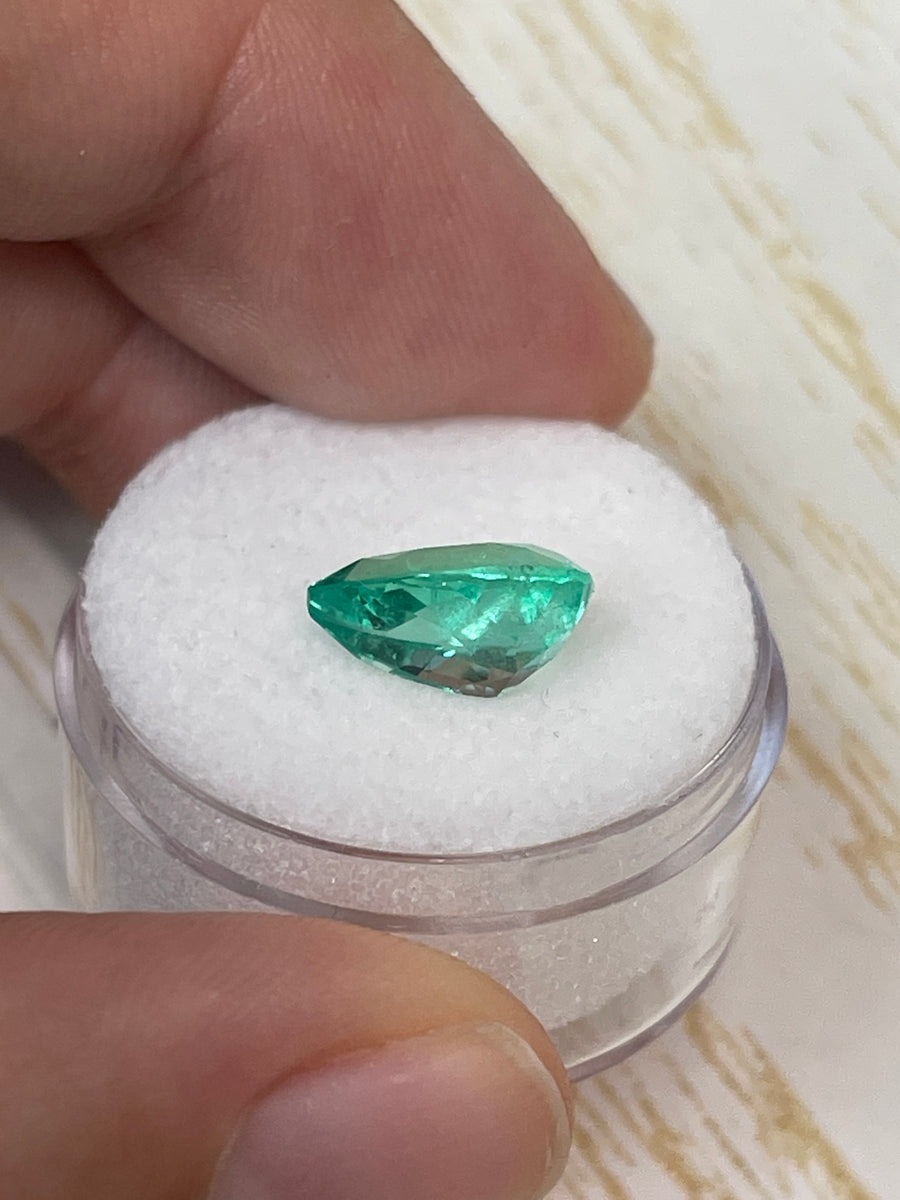 11x8 Pear Cut Colombian Emerald: 2.77 Carats, Exhibits Natural Bubbling