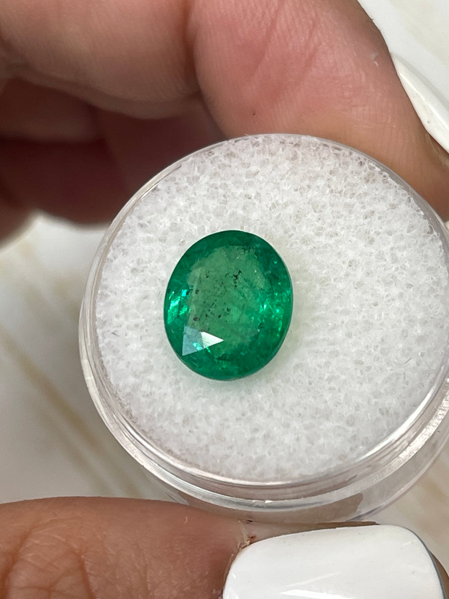 Zambian Emerald - 4.80 Carat Oval Gemstone in Unique Green Freckled Hue