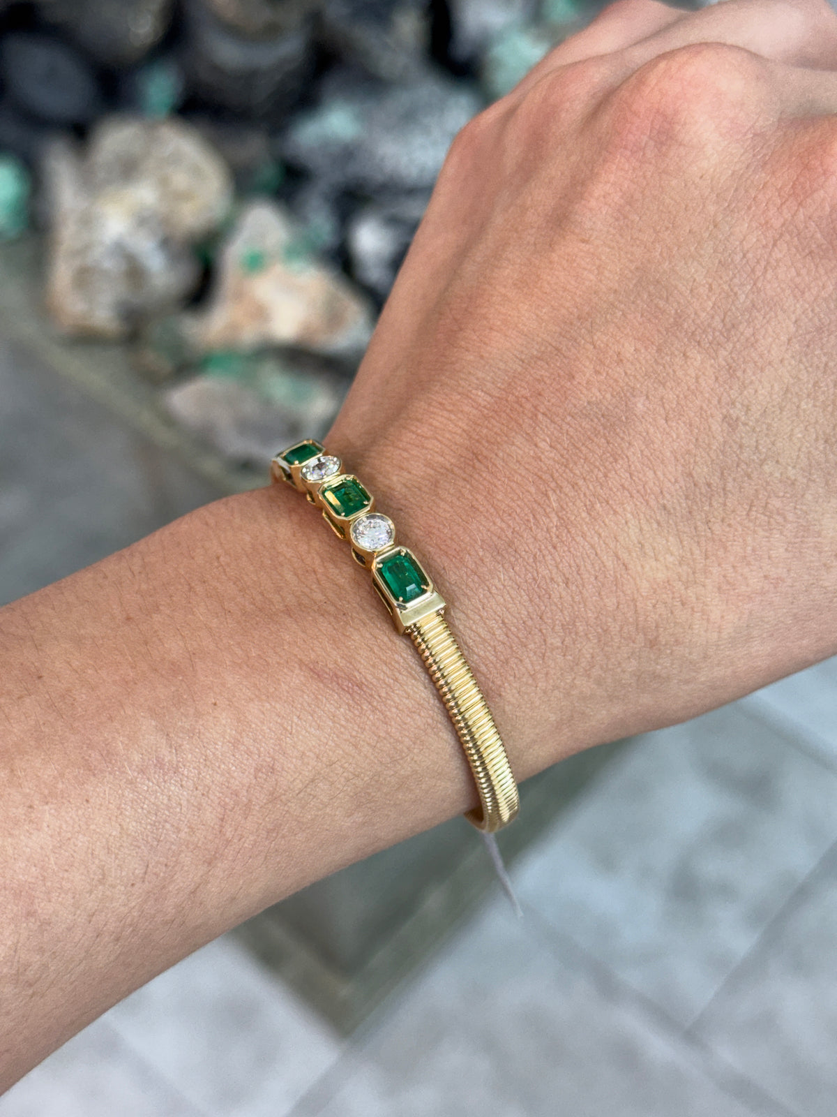 JR Colombian Emeralds 14K bangle bracelet with emerald-cut emeralds and alternating round diamonds